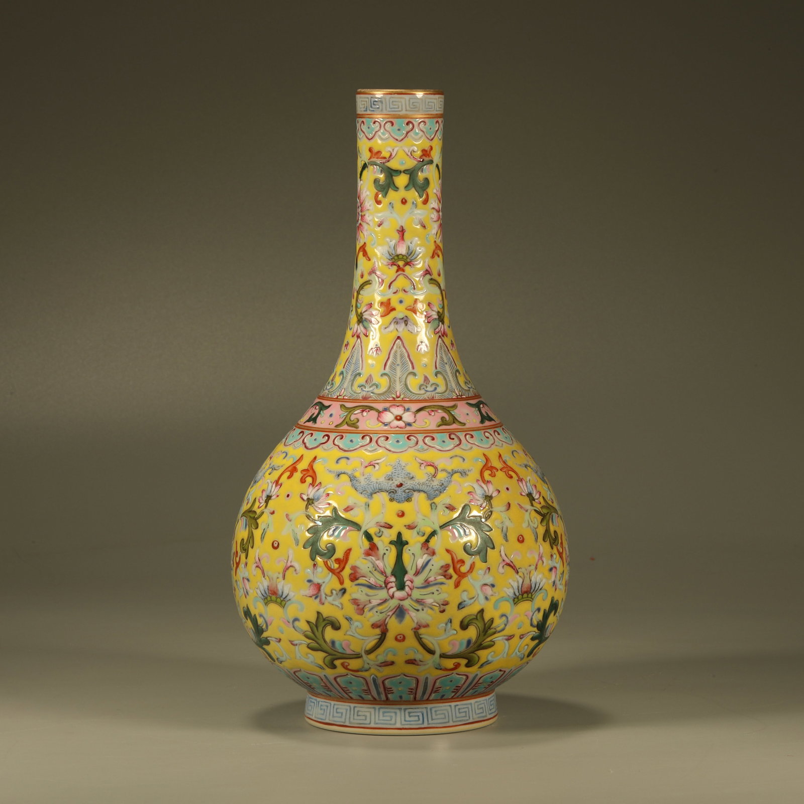 A YELLOW GROUND FAMILLE ROSE VASE WITH FLORAL PATTERN: Yellow Ground Famille Rose Vase with Floral Pattern