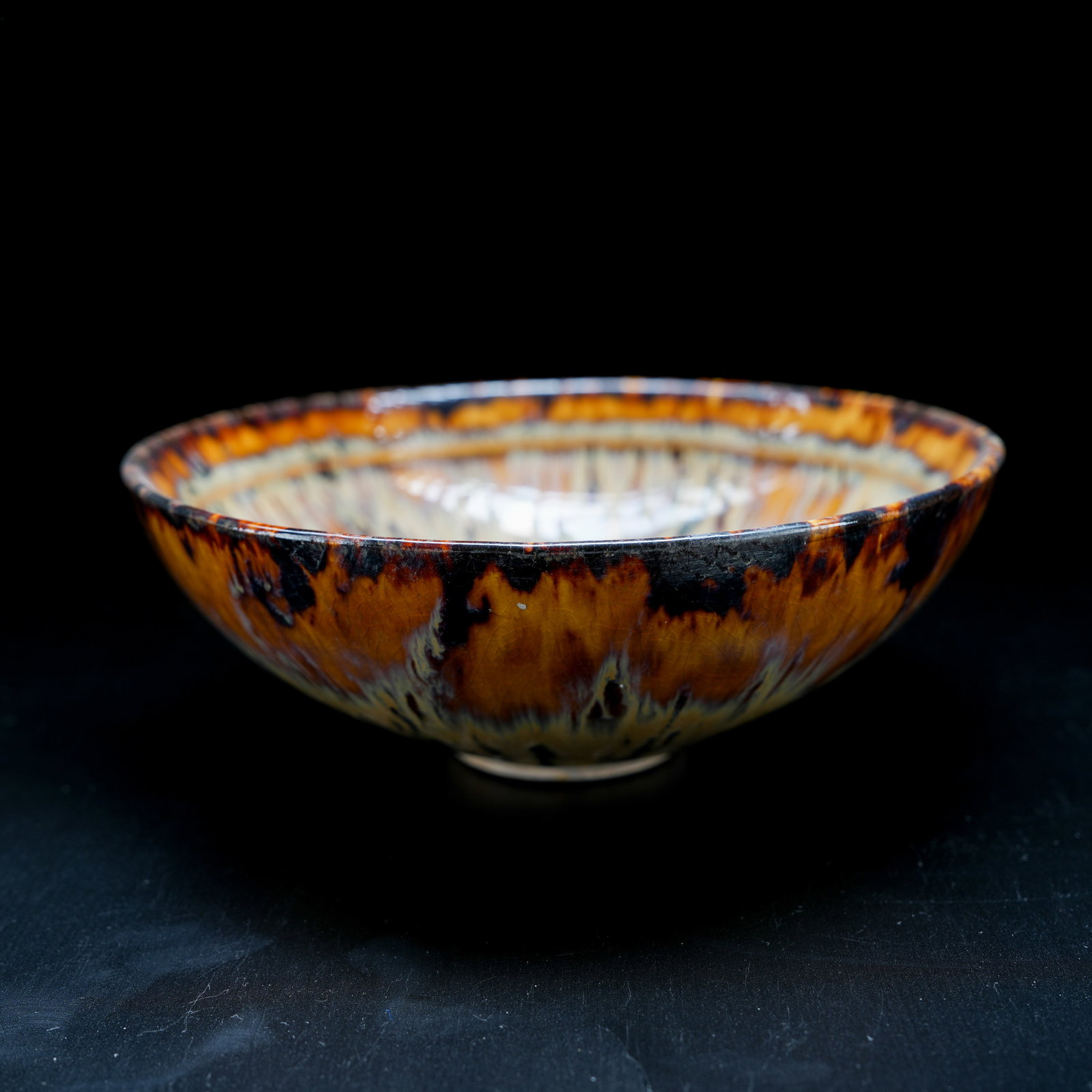 A TORTOISESHELL GLAZED TEA BOWL: Tortoiseshell Glazed Tea Bowl