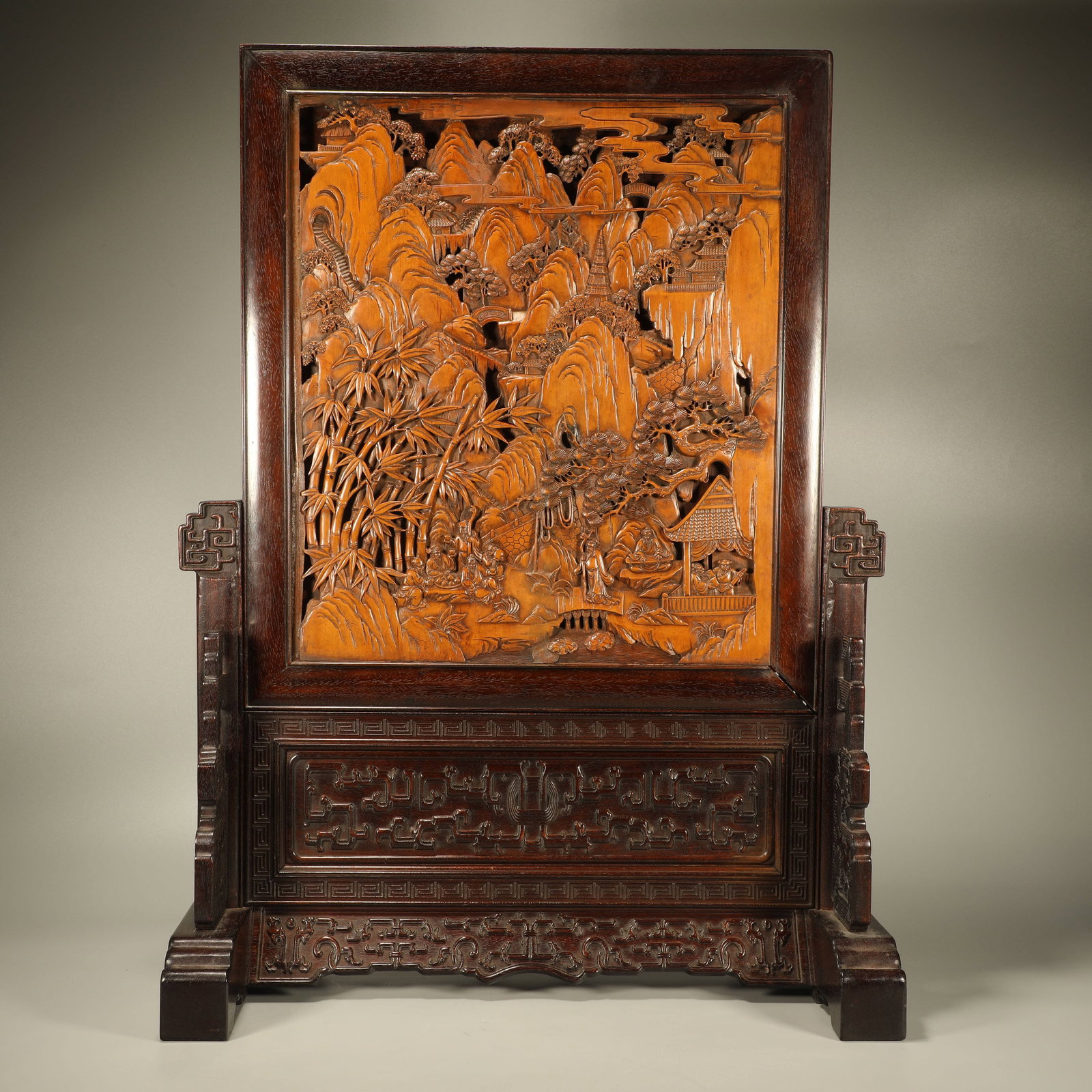 A RED SANDALWOOD TABLE SCREEN INLAID WITH BOXWOOD CARVING OF SEVEN SAGES OF THE BAMBOO GROVE: Red Sandalwood Table Screen Inlaid with Boxwood Carving of Seven Sages of the Bamboo Grove