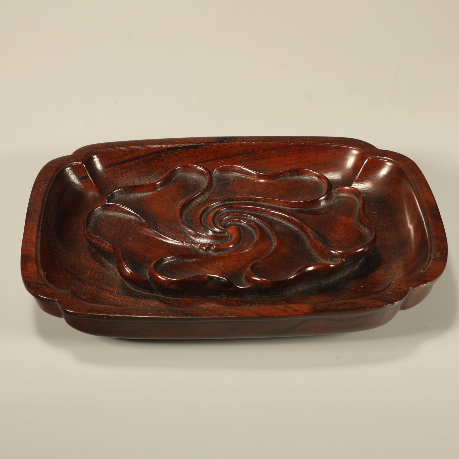 A HUANGHUALI FLORAL CARVED INK REST (1 of 6)