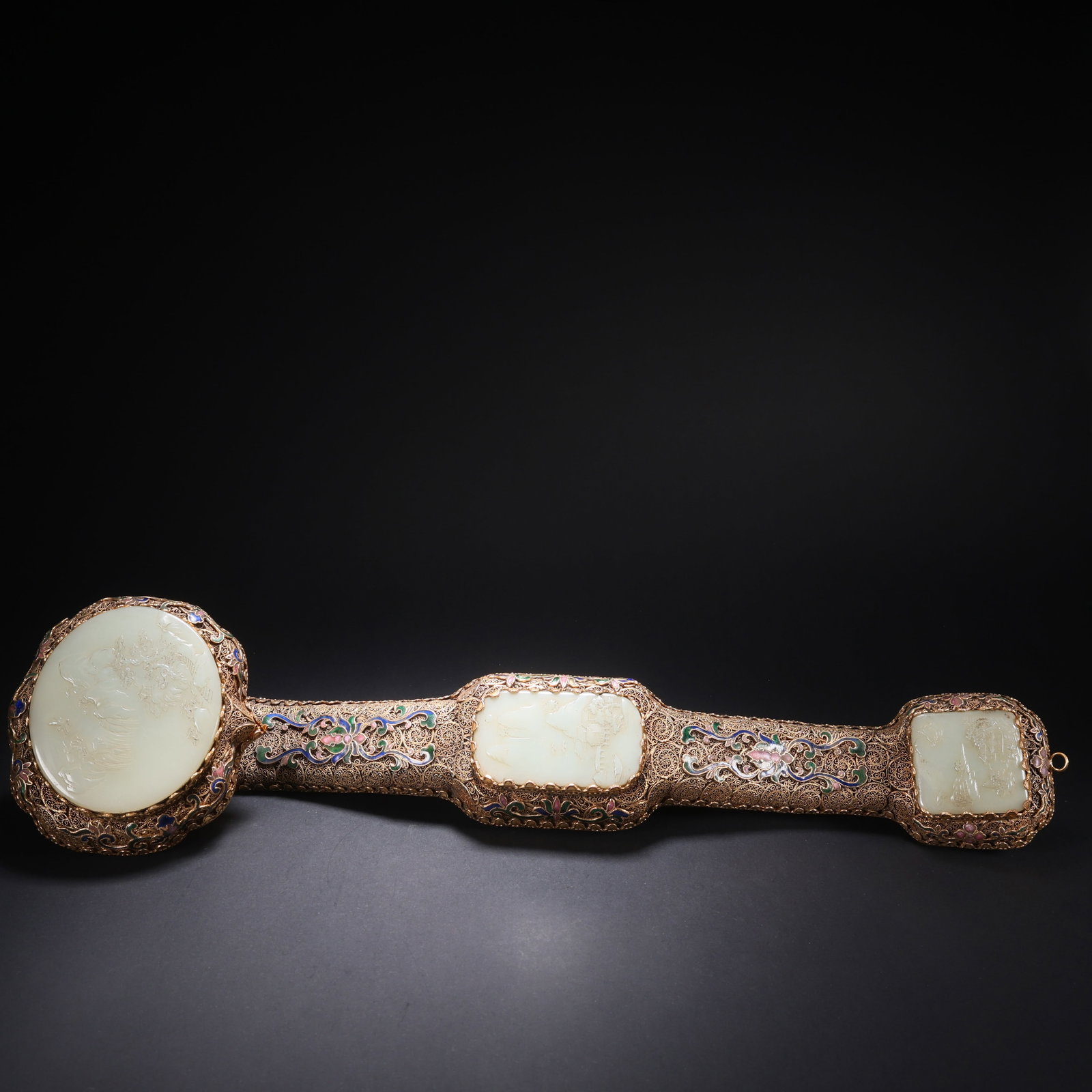A HETIAN JADE GILT-SILVER CLOISONNÉ LANDSCAPE RUYI: Hetian Jade Gilt-Silver Cloisonné Landscape Ruyi