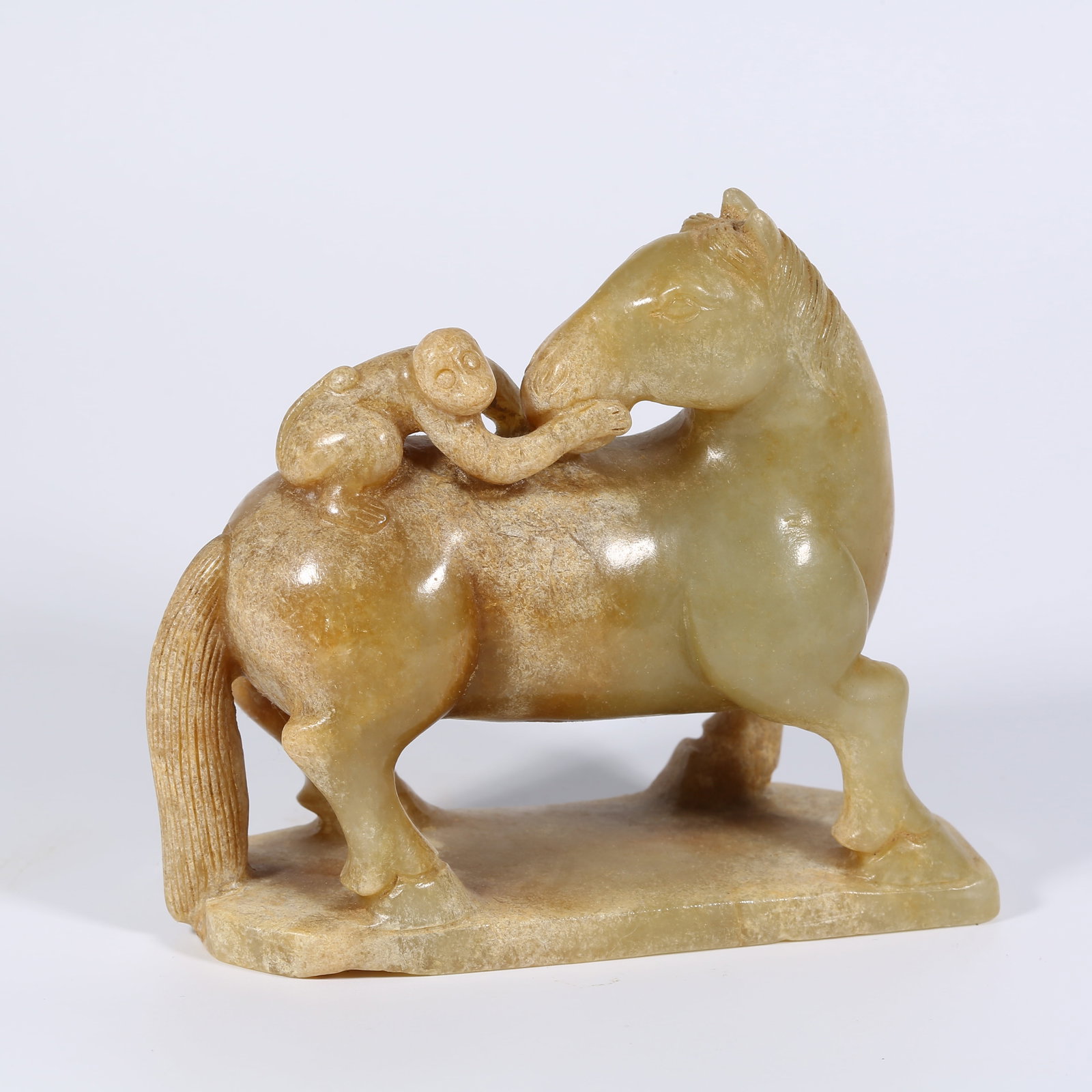 A ANCIENT JADE "IMMEDIATE PROMOTION" HORSE FIGURE: Ancient Jade "Immediate Promotion" Horse Figure