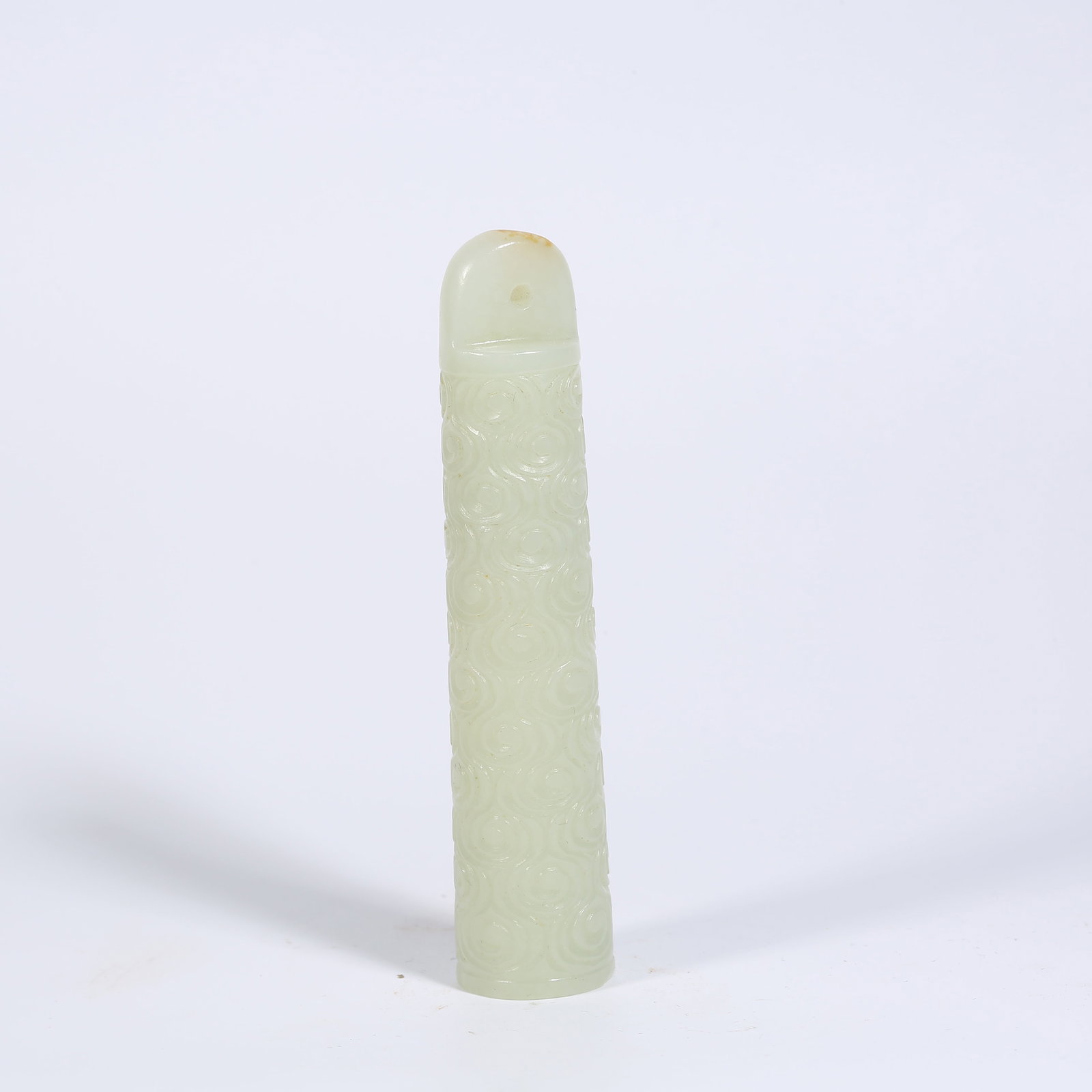 A HETIAN JADE FEATHER PEN TUBE WITH AUSPICIOUS CLOUD MOTIF: Hetian Jade Feather Pen Tube with Auspicious Cloud Motif