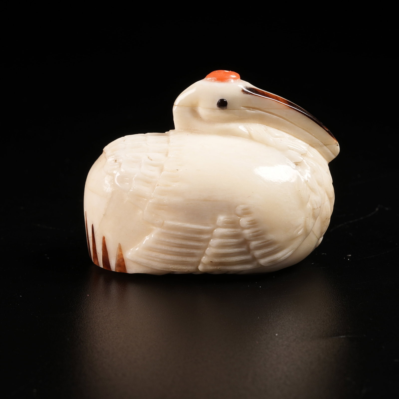 A POLYCHROME WOODEN SNUFF BOTTLE IN RED-CROWNED CRANE SHAPE (1 of 8)