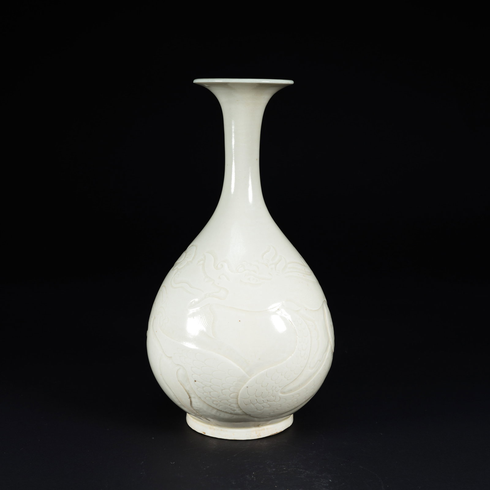 A DING KILN INCISED CLOUD AND DRAGON PATTERN FLARED-MOUTH BOTTLE (1 of 9)