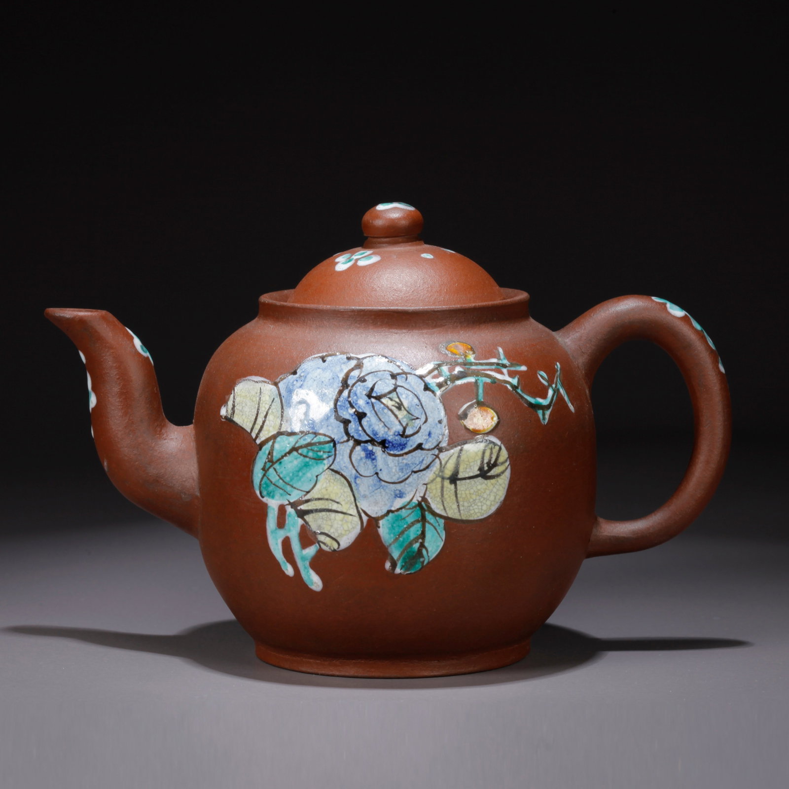 A PURPLE CLAY (ZISHA) FLORAL-PATTERNED TEAPOT (1 of 9)