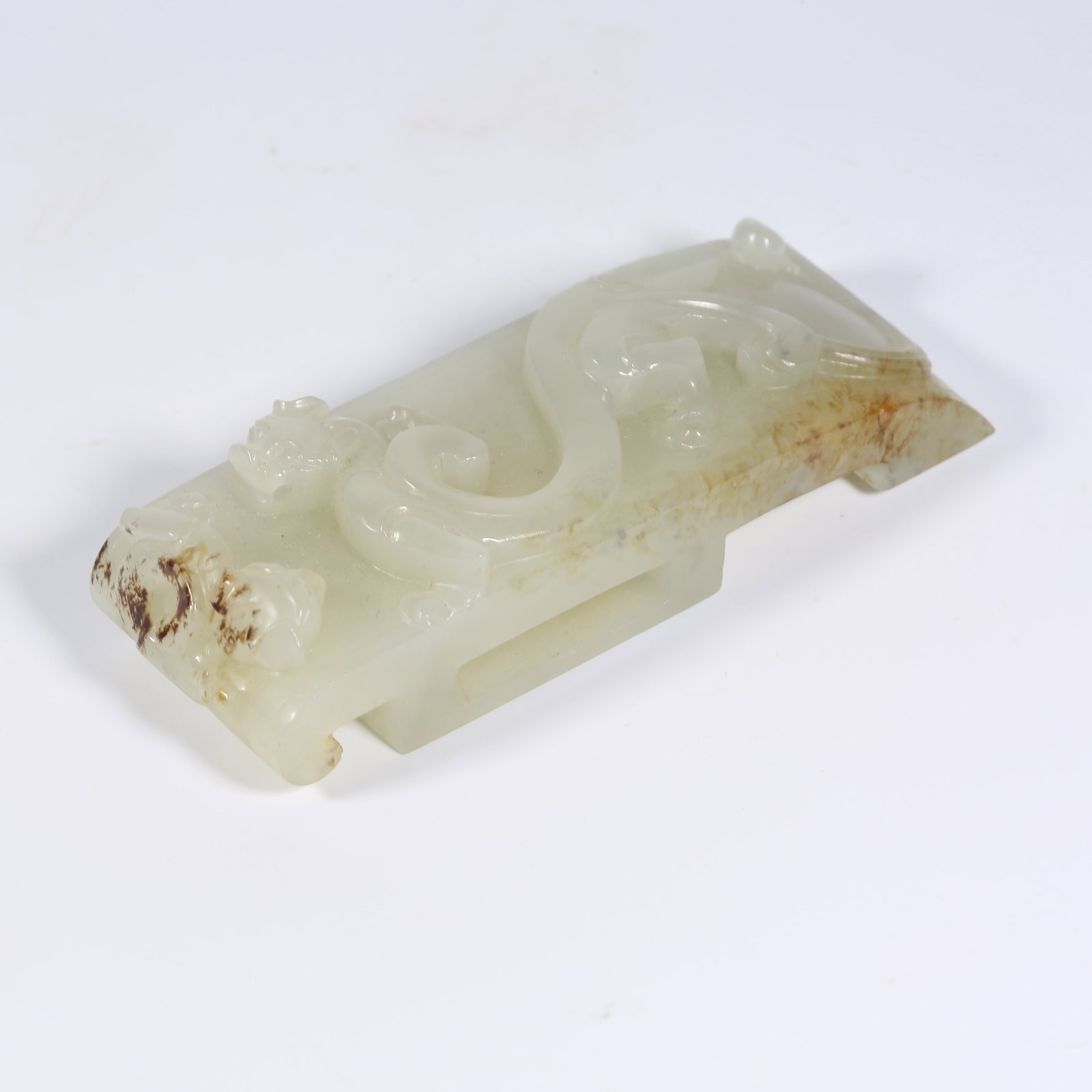A ANCIENT JADE SWORD FITTING WITH CHI-DRAGON MOTIF: Ancient Jade Sword Fitting with Chi-Dragon Motif