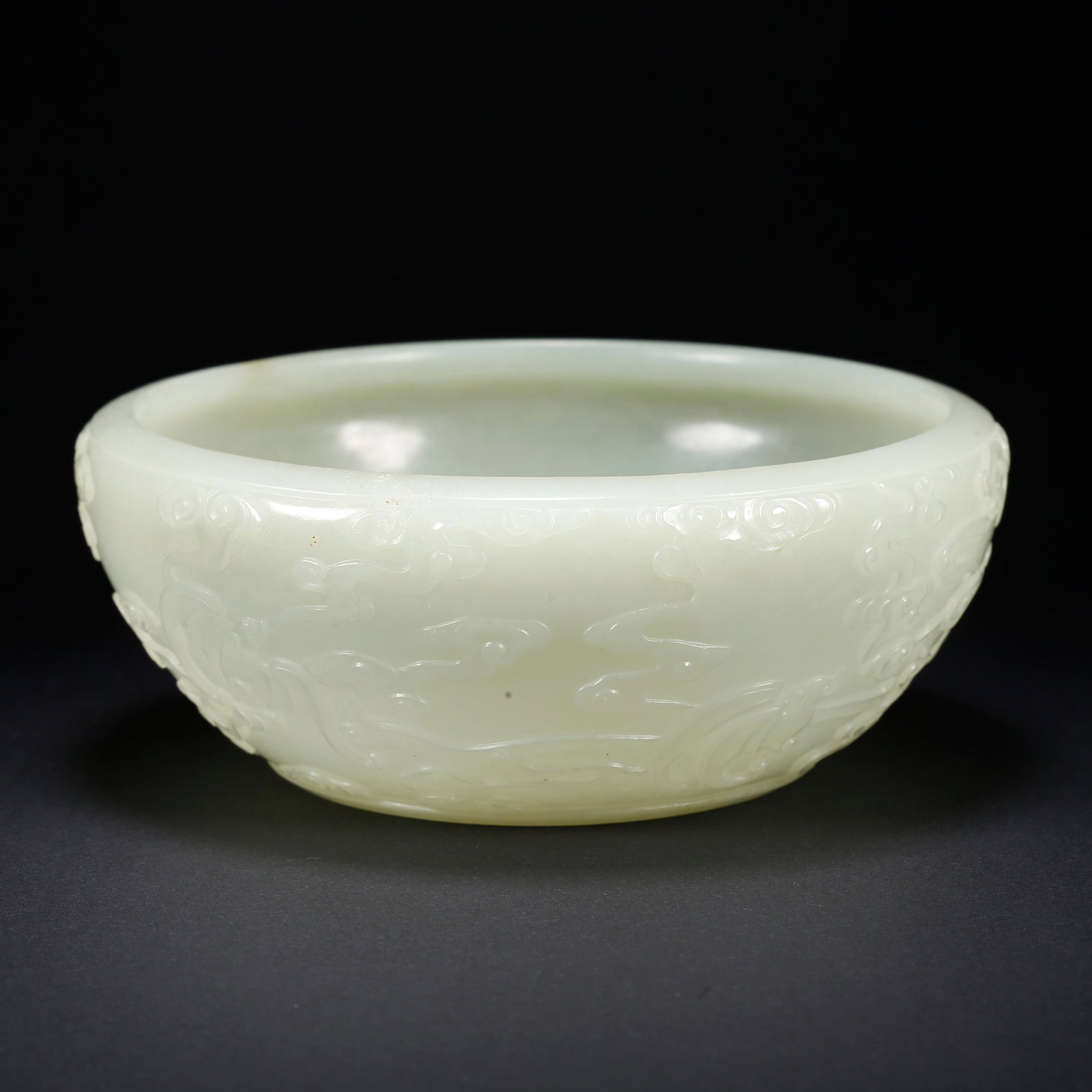 A HETIAN JADE WASHER WITH CLOUD AND FU PATTERN: Hetian Jade Washer with Cloud and Fu Pattern