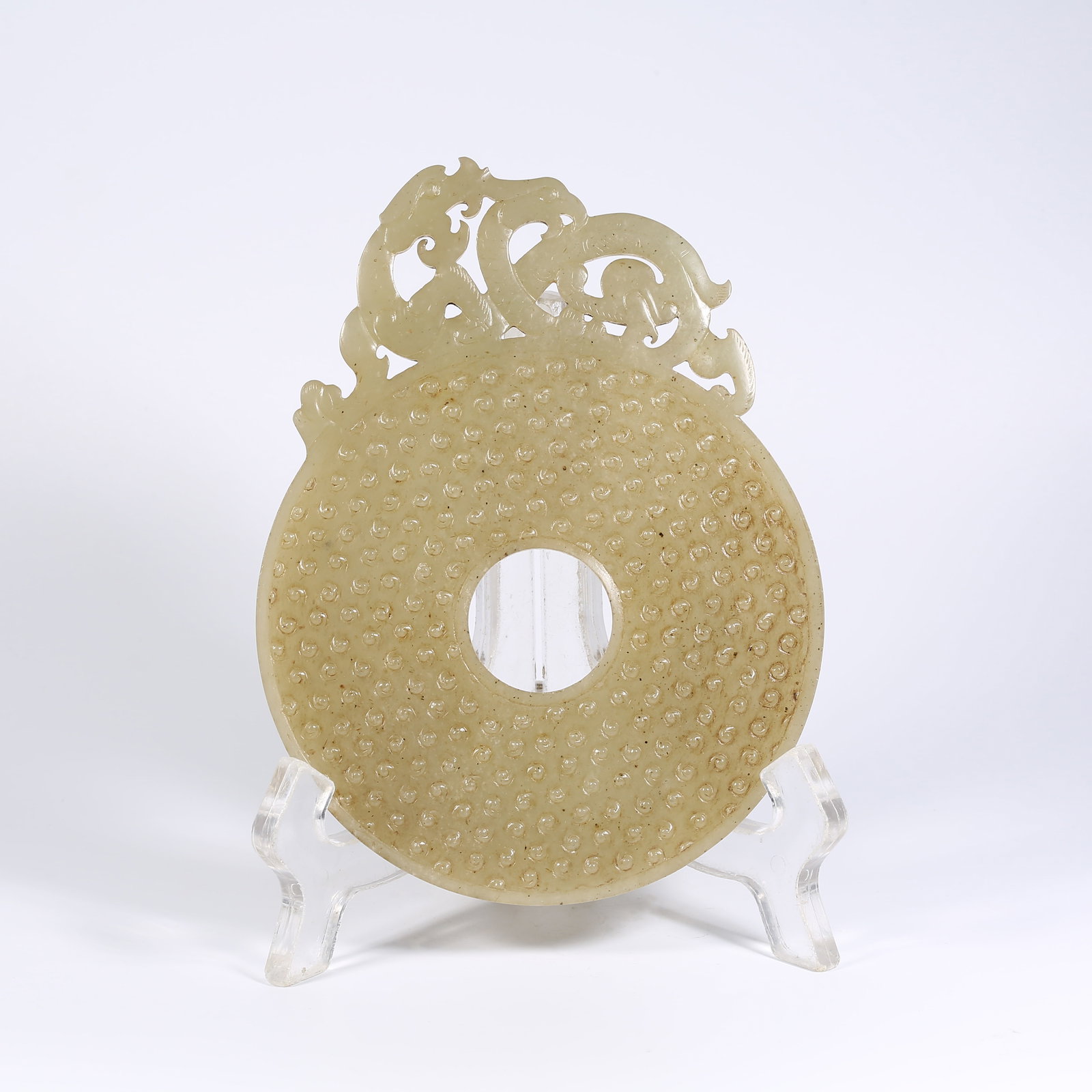 A ANCIENT JADE EXPANDED-EDGE BI DISK WITH DRAGON MOTIF (1 of 9)