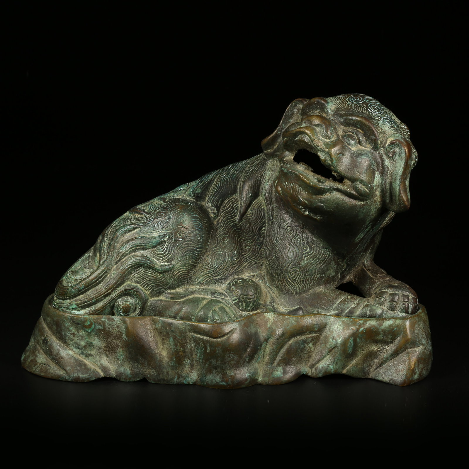 A BRONZE AUSPICIOUS LION ORNAMENT (1 of 9)
