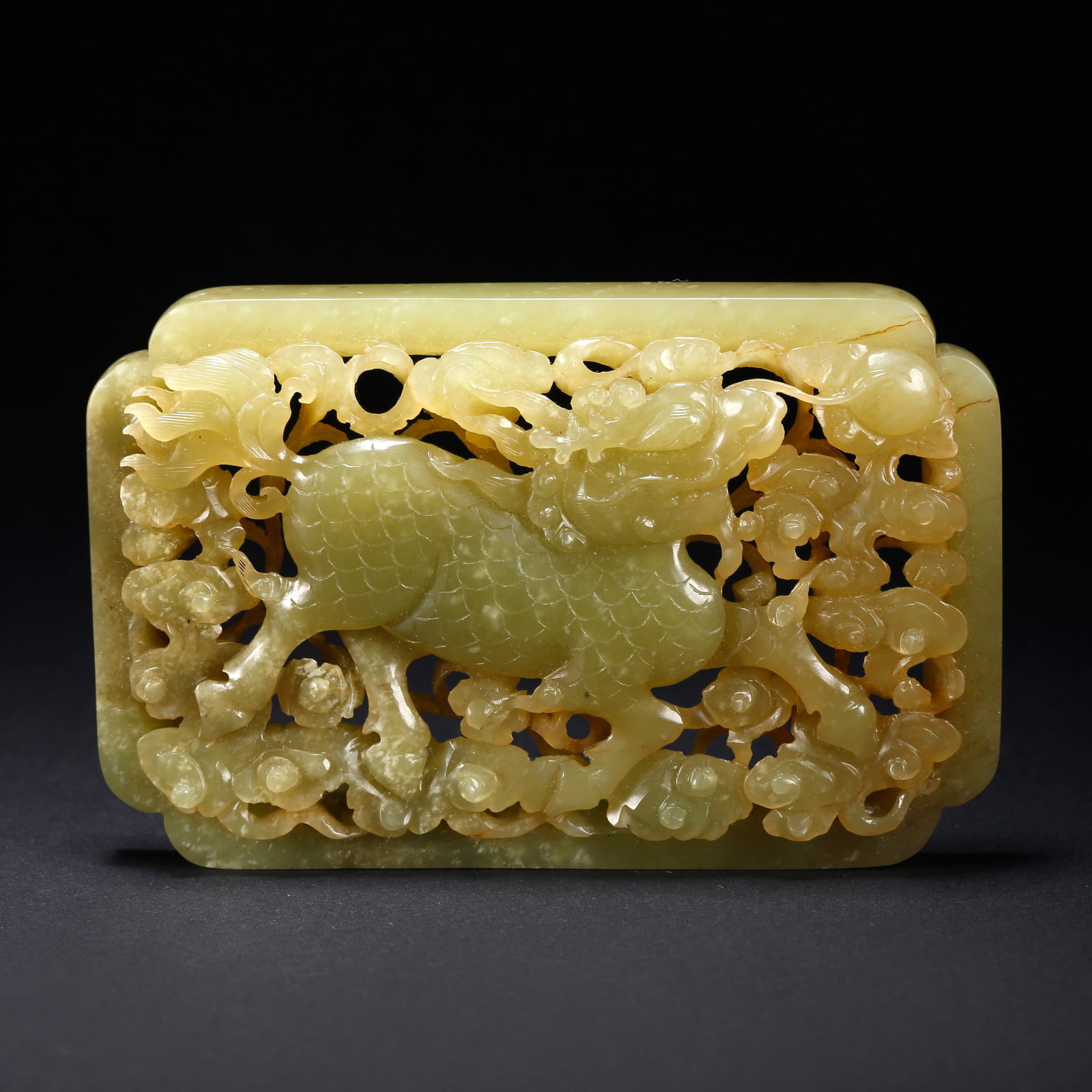 A HETIAN YELLOW JADE QILIN MOTIF PENDANT: Hetian Yellow Jade Qilin Motif Pendant