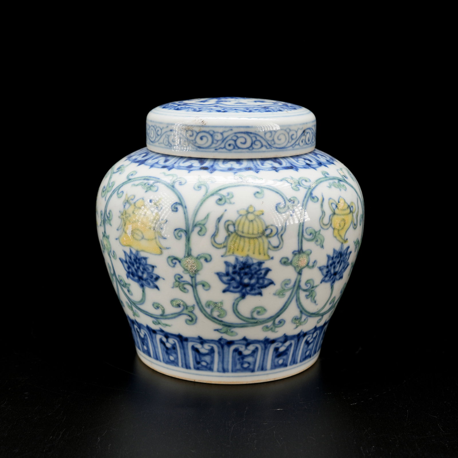 A DOUCAI "HEAVEN" JAR WITH INTERTWINED PRECIOUS FLOWER PATTERN: Doucai "Heaven" Jar with Intertwined Precious Flower Pattern