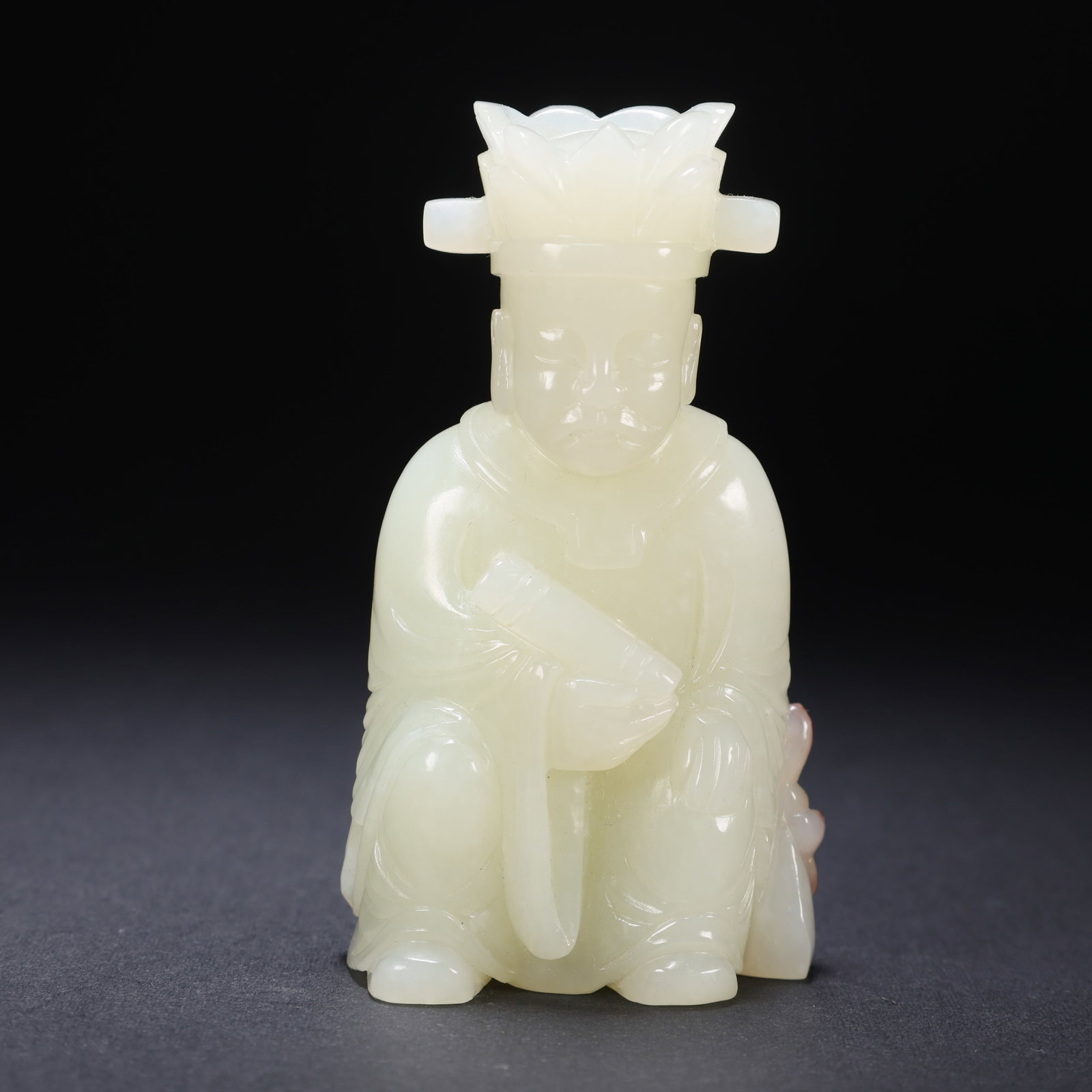 A HETIAN JADE OFFICIAL FIGURE IN CONTRASTING COLOR: Hetian Jade Official Figure in Contrasting Color