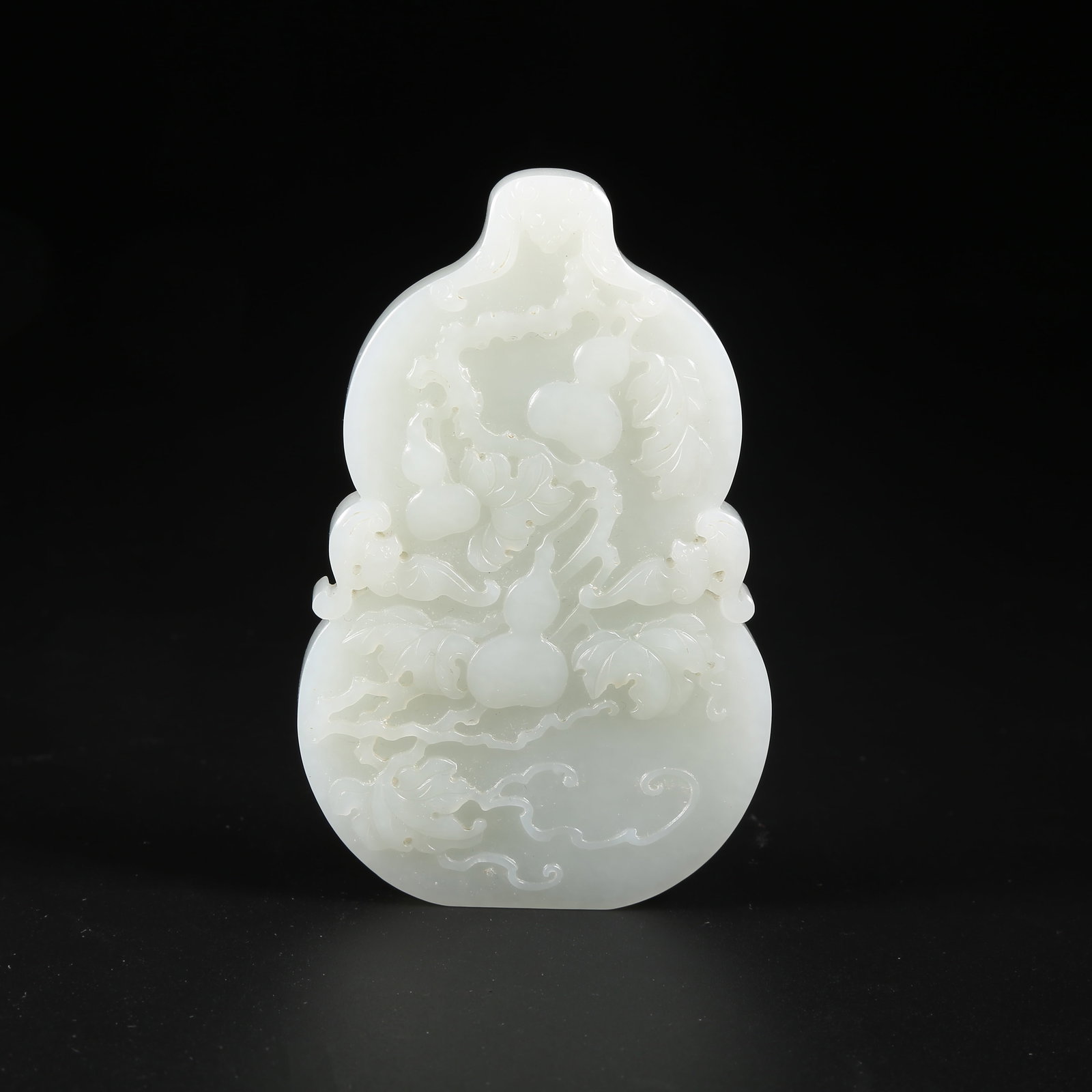 A HETIAN WHITE JADE GOURD PLAQUE WITH "BLESSINGS AND PROSPERITY FOR TEN THOUSAND GENERATIONS" (1 of 8)