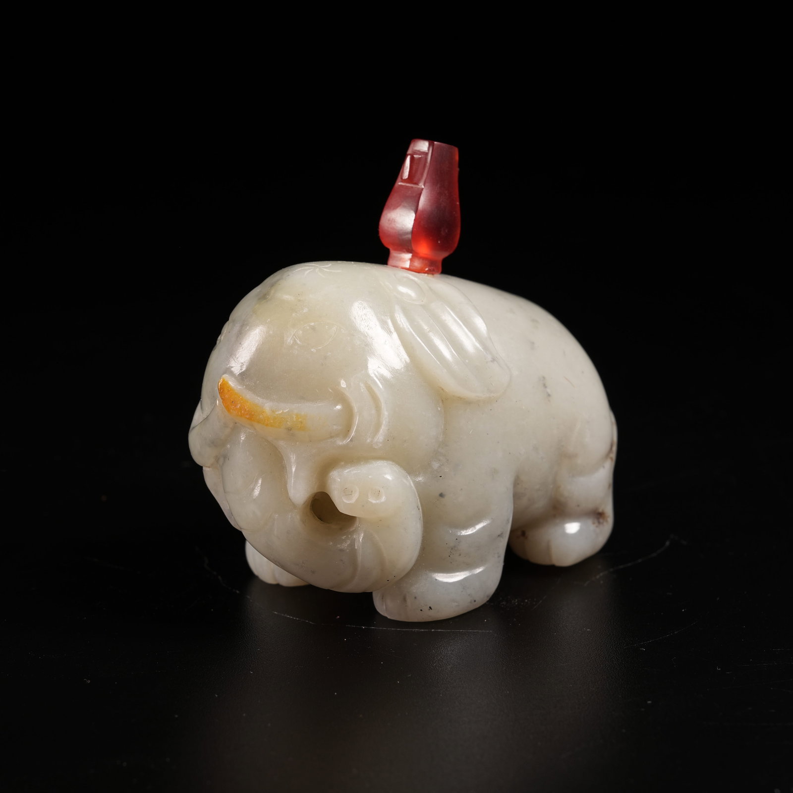 A HETIAN JADE "PEACEFUL ELEPHANT" SNUFF BOTTLE: Hetian Jade "Peaceful Elephant" Snuff Bottle