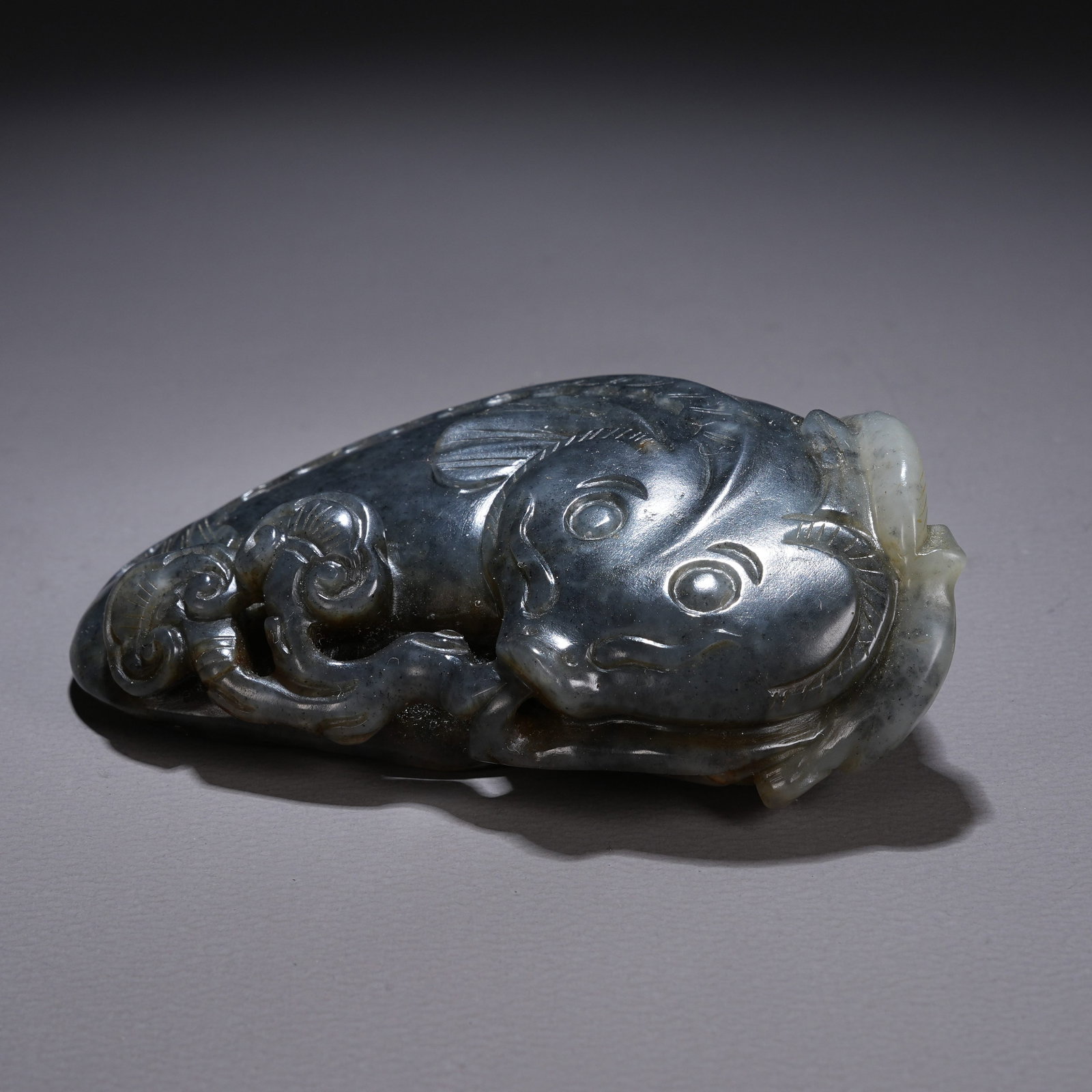 A HETIAN JADE "ABUNDANCE YEAR AFTER YEAR" HANDHELD ORNAMENT: Hetian Jade "Abundance Year After Year" Handheld Ornament