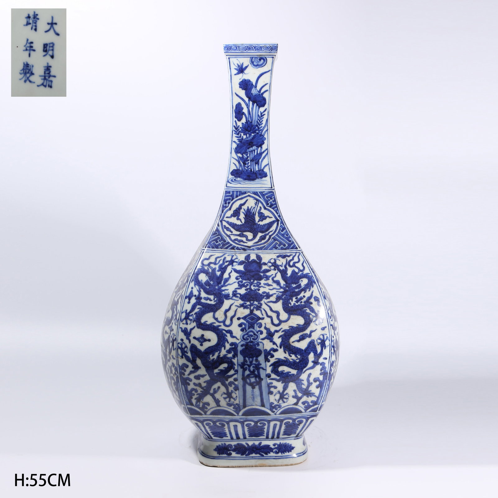 A BLUE-AND-WHITE CLOUD AND DRAGON THROUGH-FLOWER SQUARE LONG-NECK VASE: Blue-and-White Cloud and Dragon Through-Flower Square Long-Neck Vase
