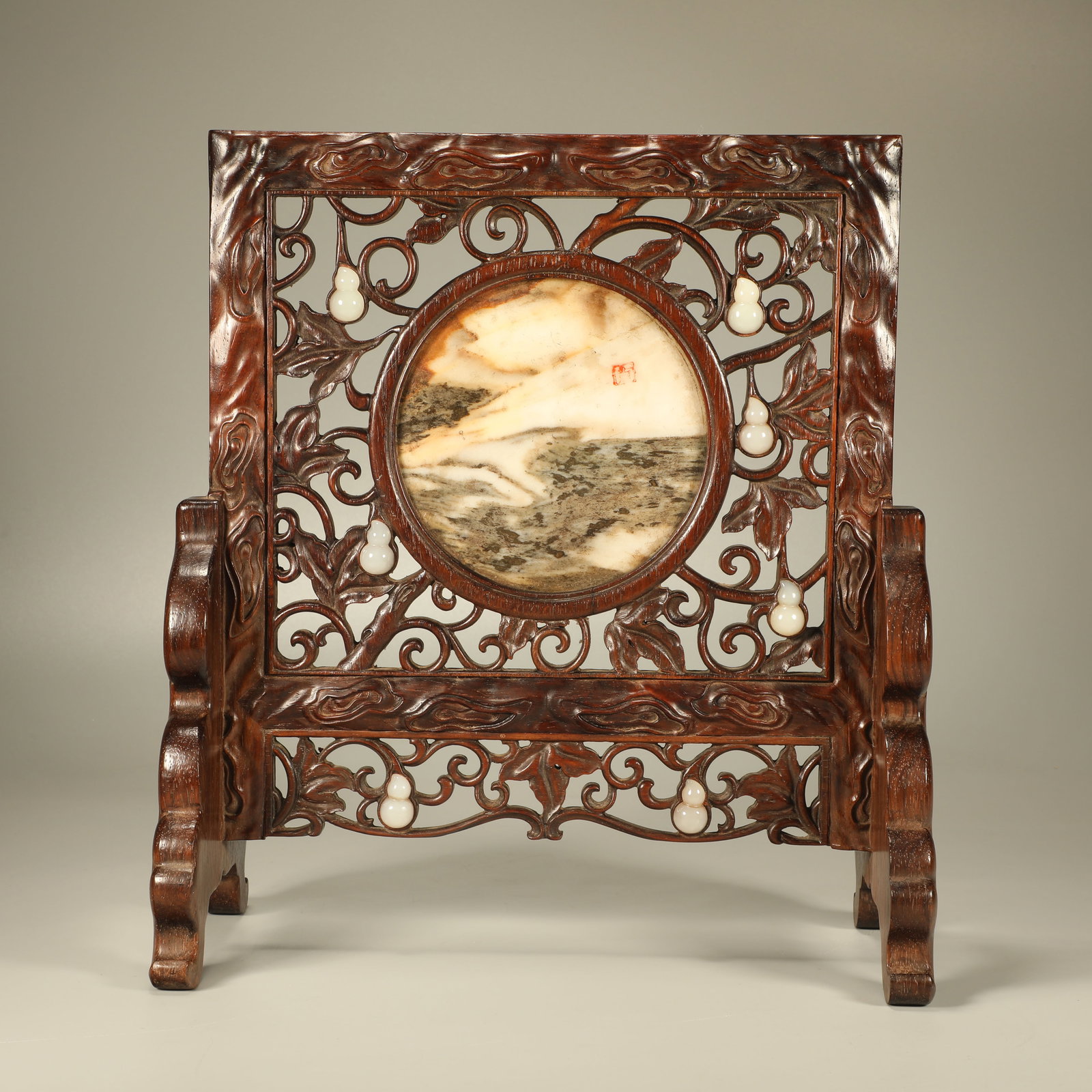 A HUANGHUALI STANDING SCREEN CARVED WITH FORTUNE AND LONGEVITY MOTIF INLAID WITH JADE AND MARBLE: Huanghuali Standing Screen Carved with Fortune and Longevity Motif Inlaid with Jade and Marble