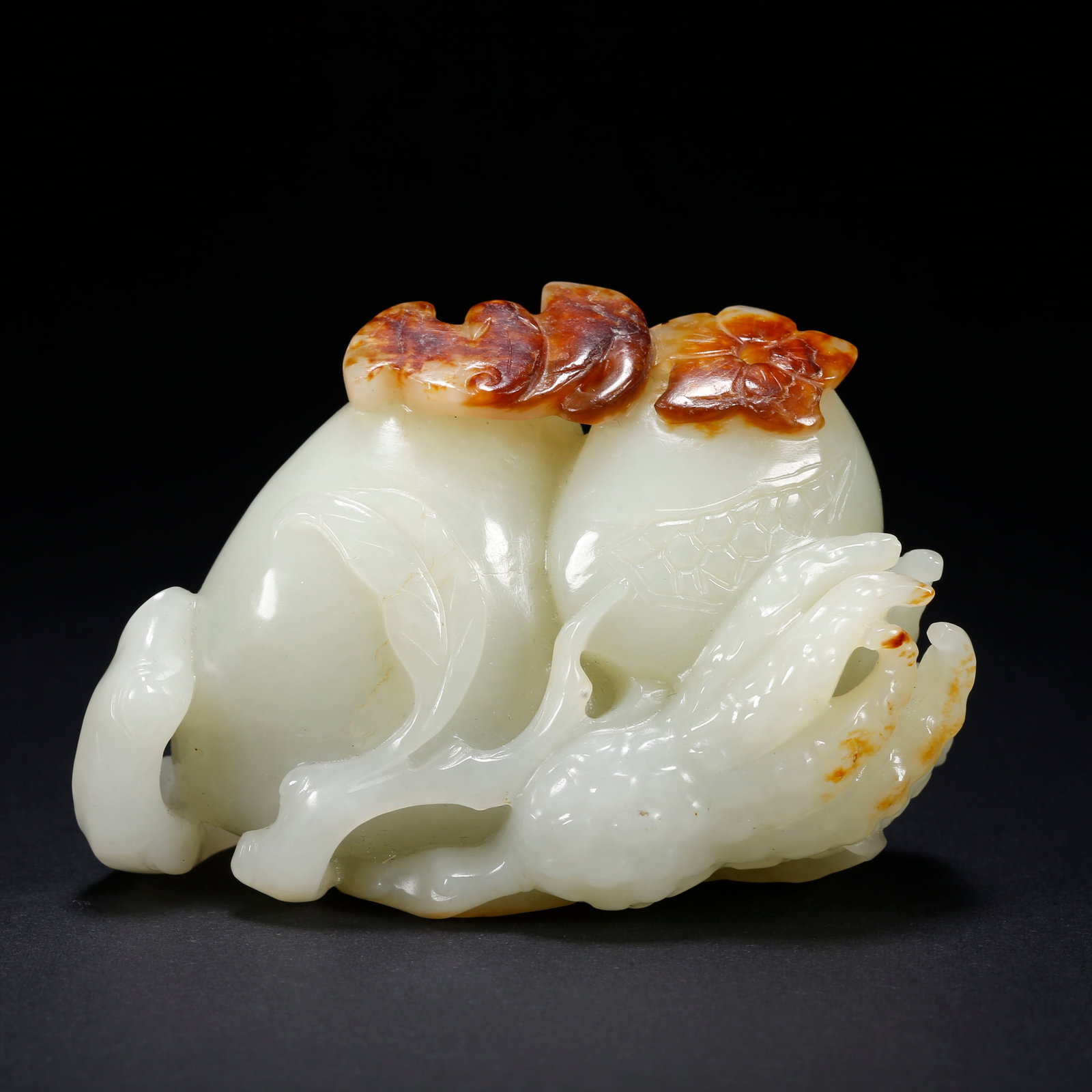 A HETIAN JADE FIGURINE OF FU, LU, AND SHOU: Hetian Jade Figurine of Fu, Lu, and Shou