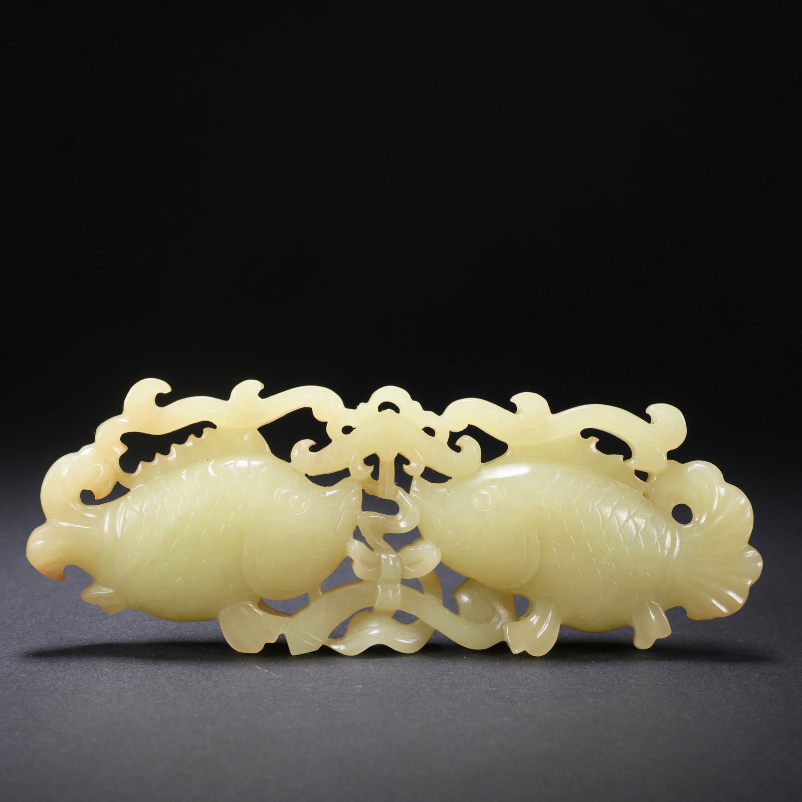 A TIANHUANG JADE DOUBLE FISH ORNAMENT: Tianhuang Jade Double Fish Ornament