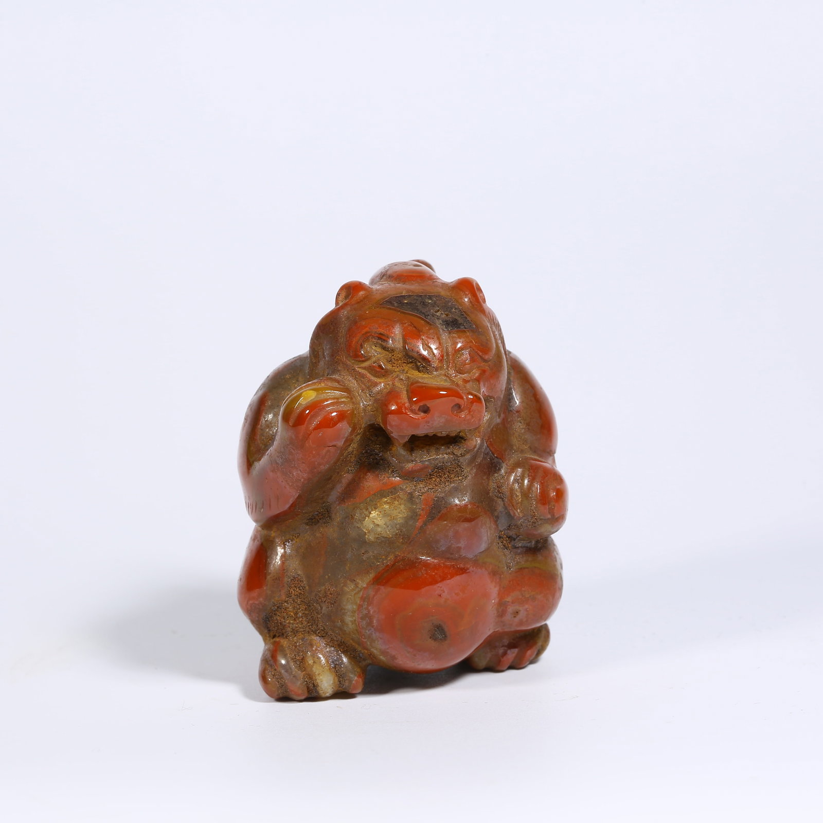 A WARRING STATES RED AGATE BEAR: Warring States Red Agate Bear