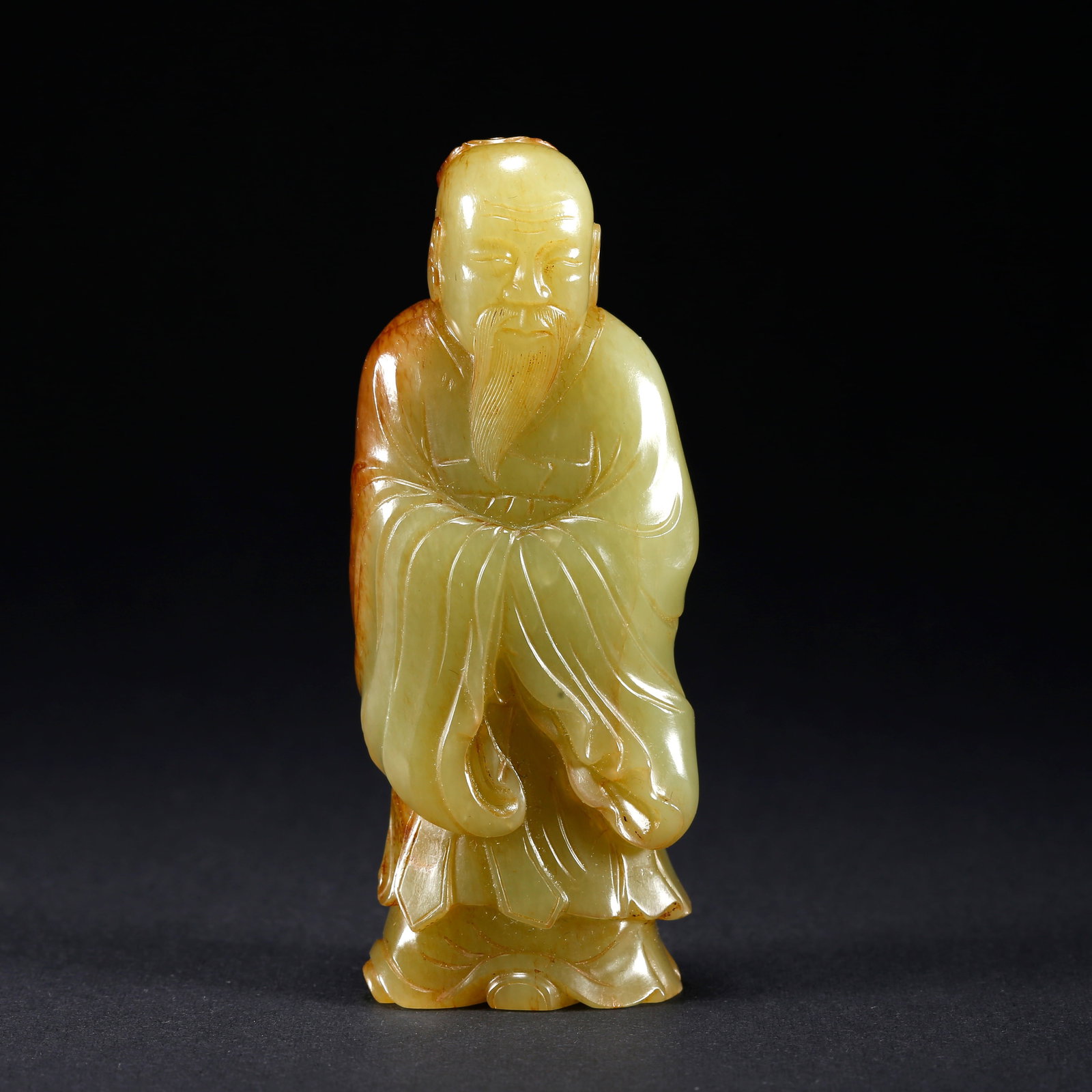 A HETIAN YELLOW JADE FIGURINE (1 of 9)