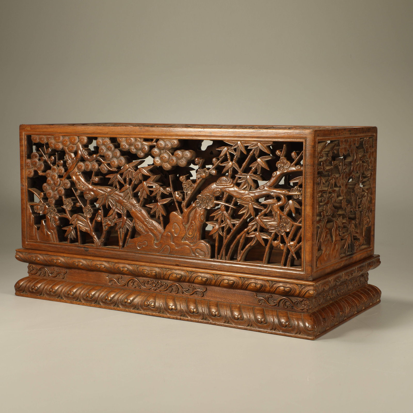 A GOLDEN NANMU OPENWORK LIDDED BOX WITH PINE, BAMBOO AND PLUM PATTERN (1 of 6)