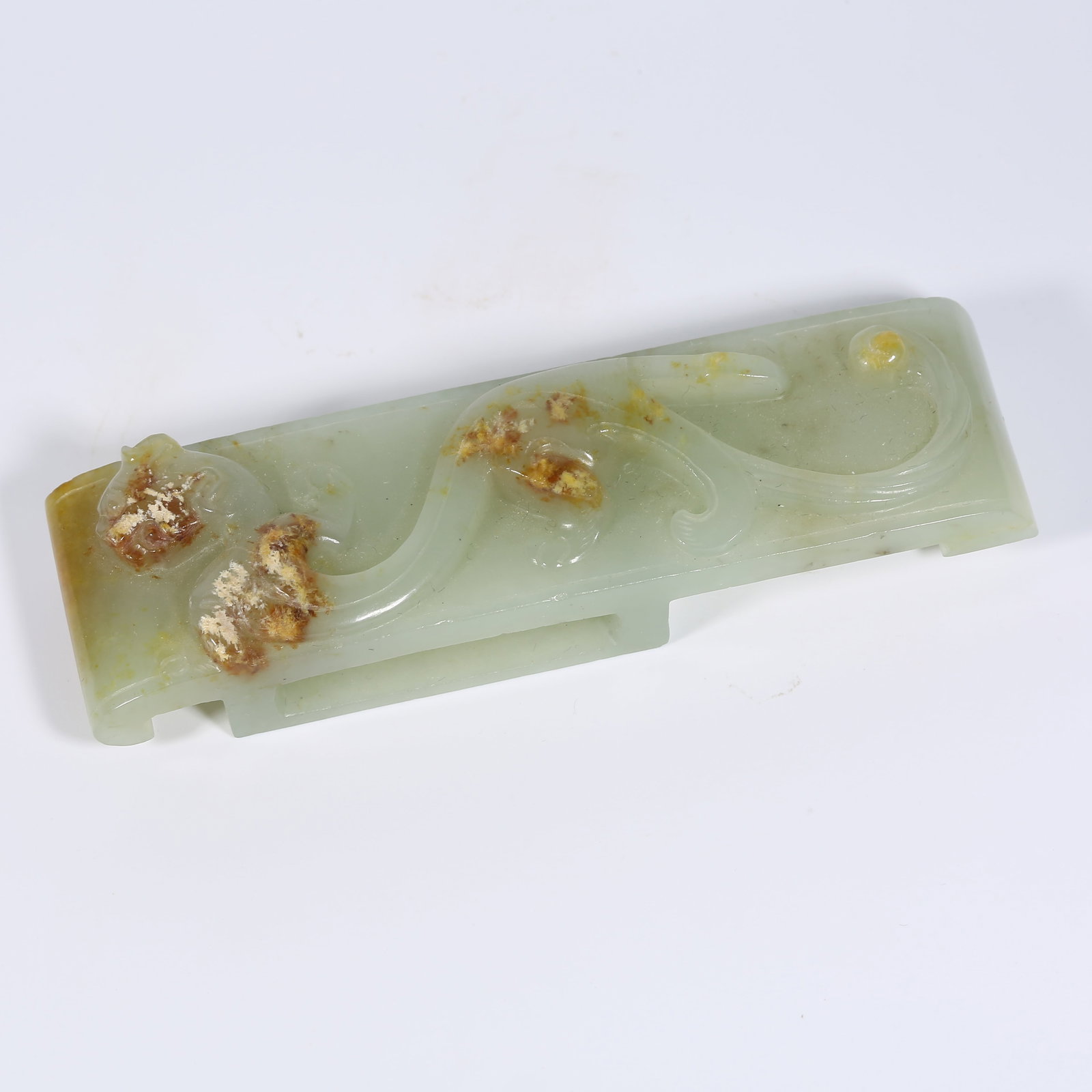 A ANCIENT JADE SWORD FITTING WITH CHI-DRAGON MOTIF: Ancient Jade Sword Fitting with Chi-Dragon Motif