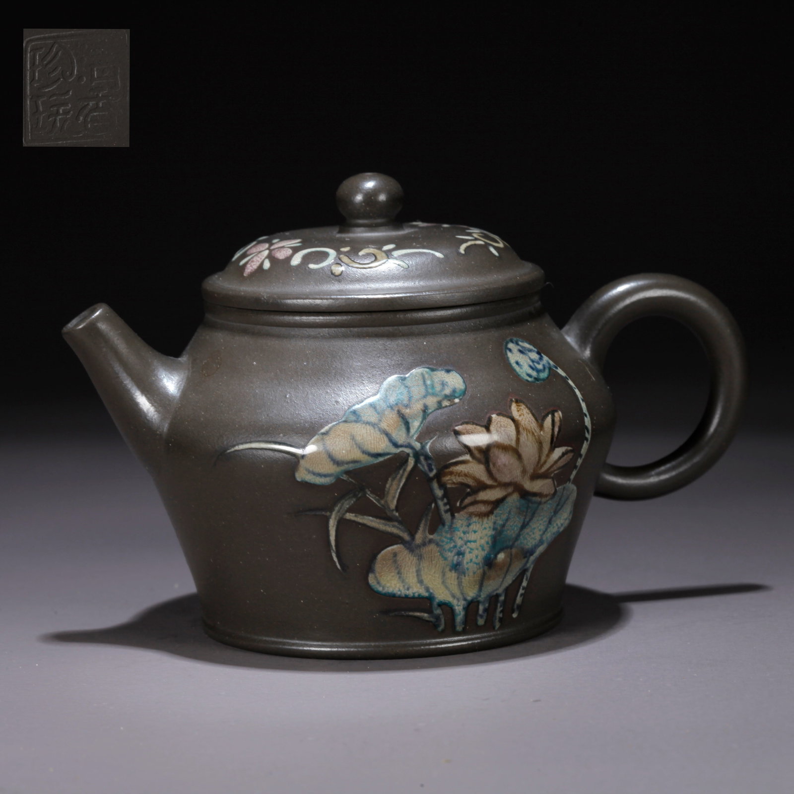 A PURPLE CLAY (ZISHA) FLORAL TEAPOT (1 of 9)