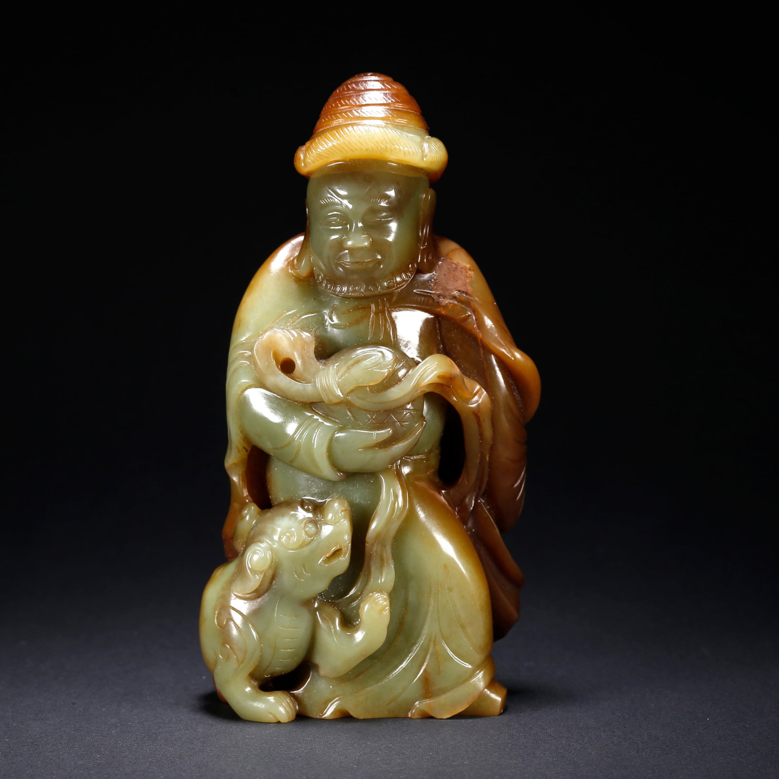 A HETIAN JADE FIGURINE (1 of 9)