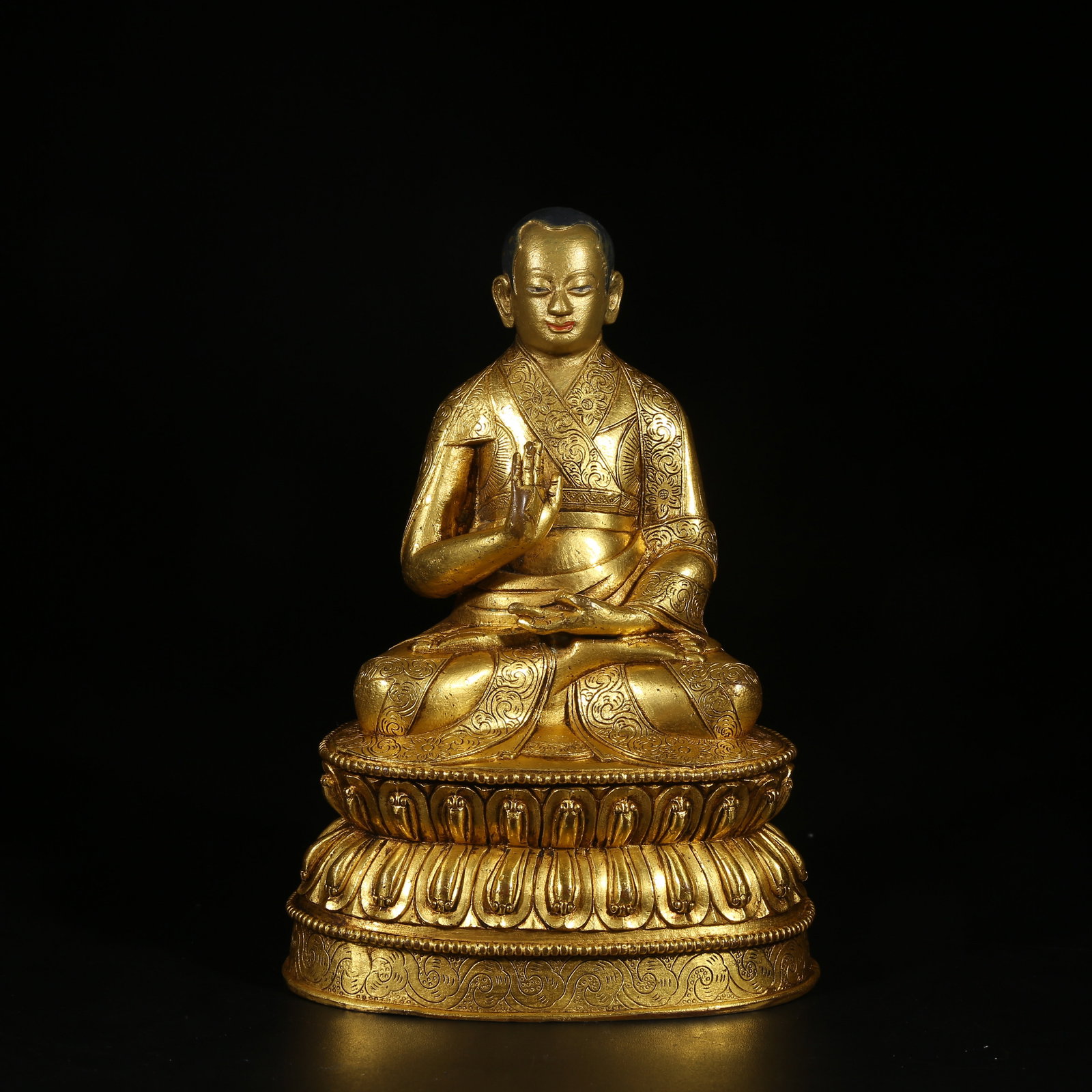 A GILT-BRONZE STATUE OF A LAMA (1 of 8)