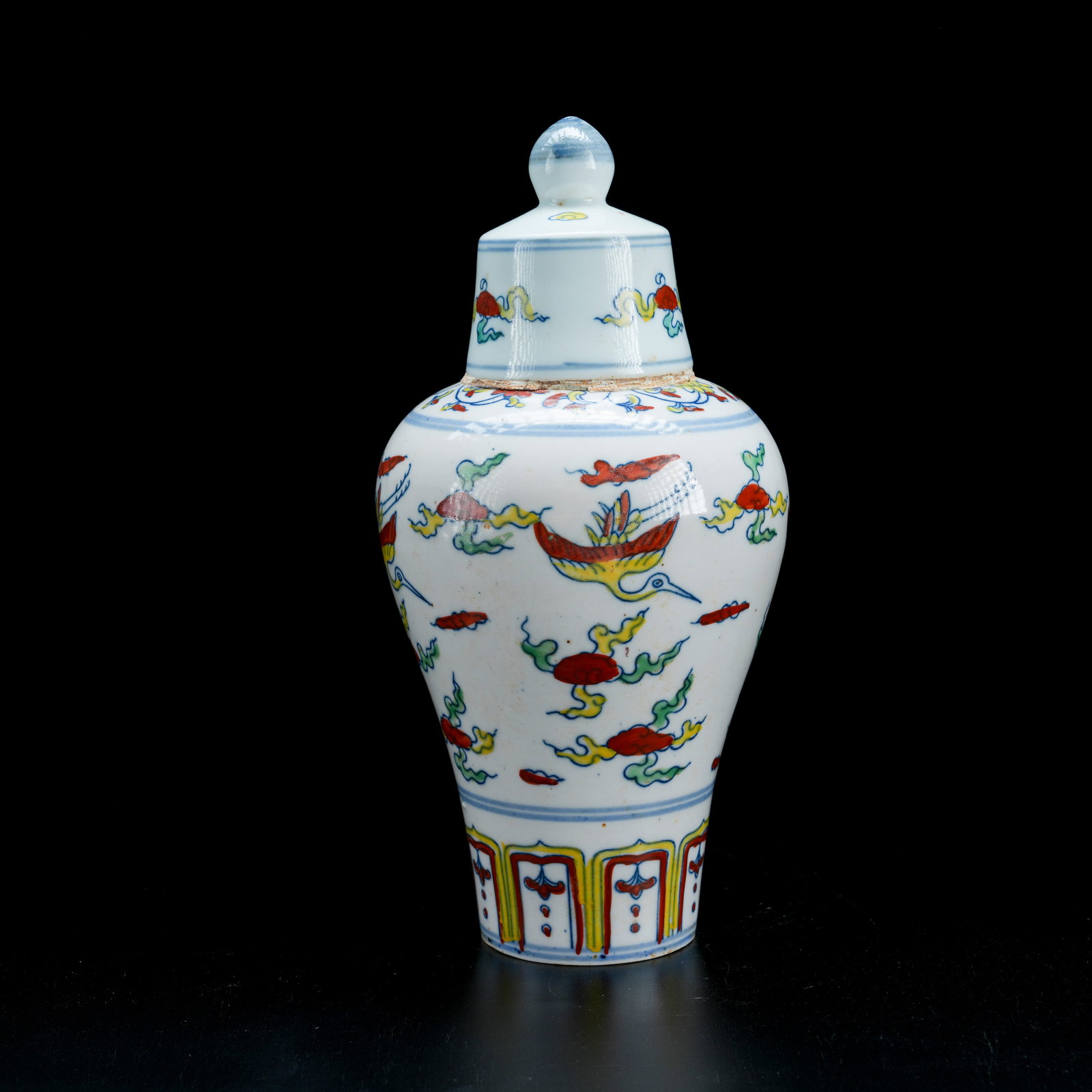 A DOUCAI COVERED JAR WITH CRANE MOTIF (1 of 9)
