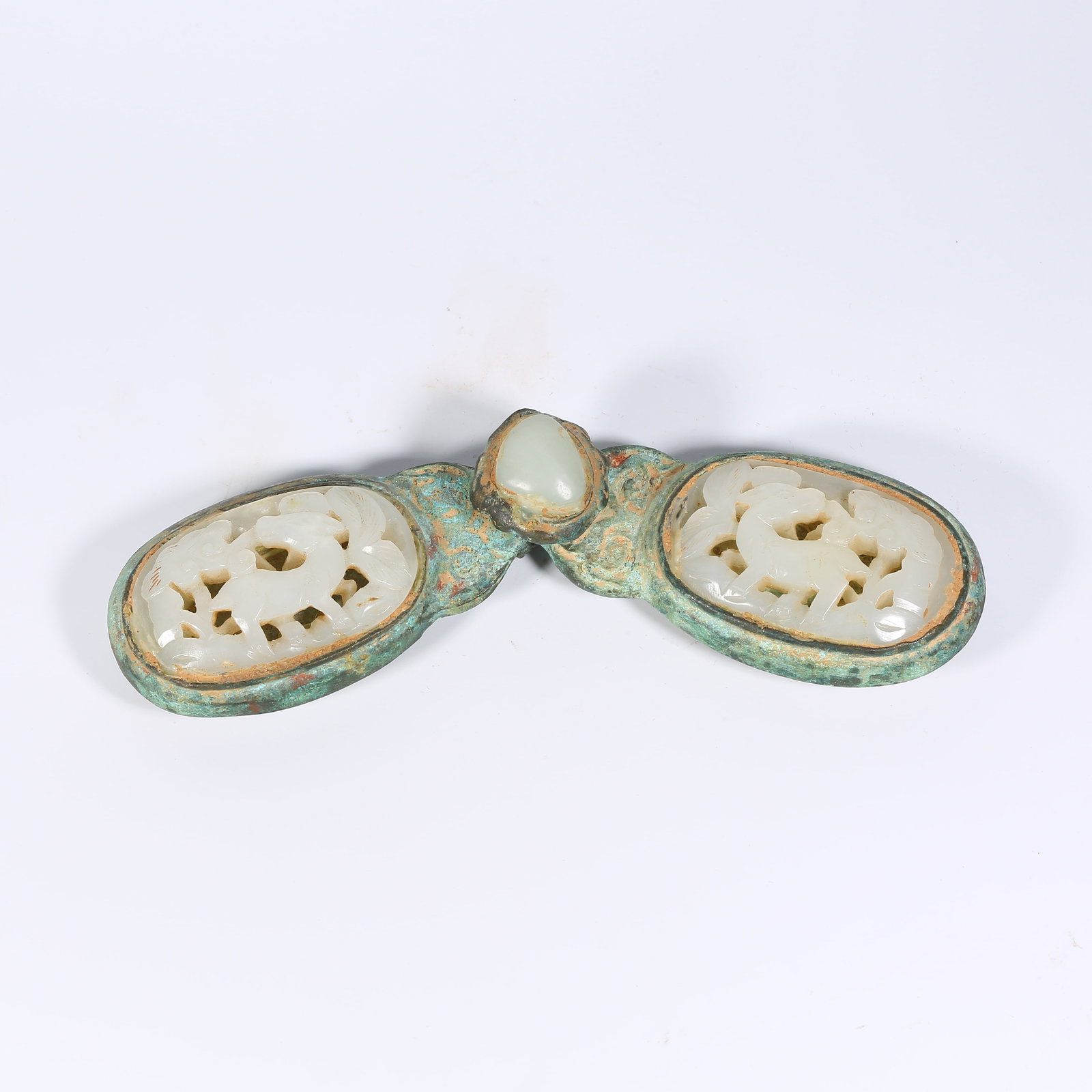 A BRONZE BELT BUCKLE INLAID WITH HETIAN JADE: Bronze Belt Buckle Inlaid with Hetian Jade