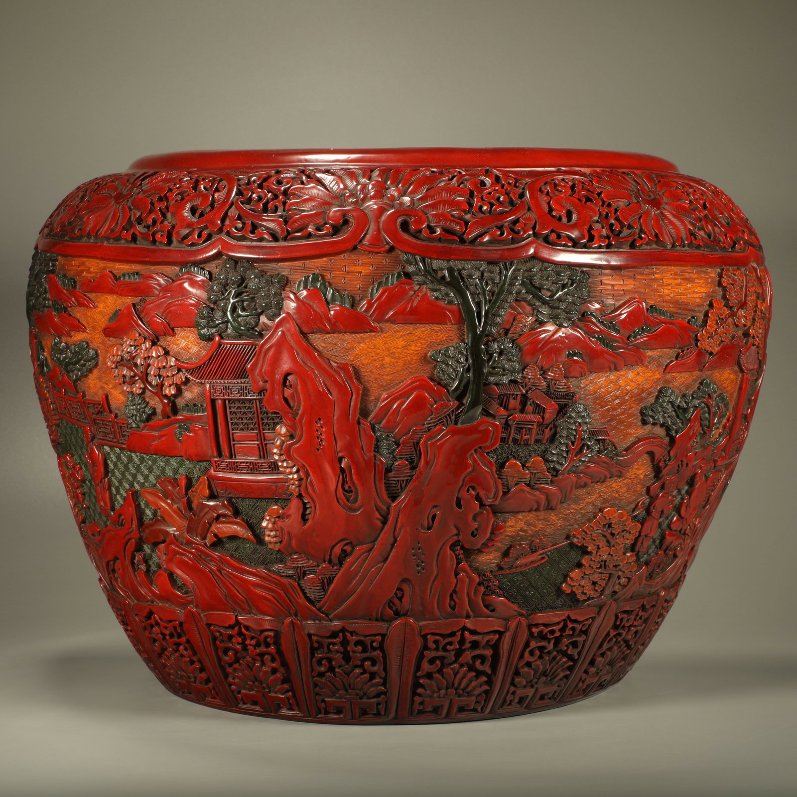 A LACQUER WALL CYLINDER WITH LANDSCAPE AND FIGURE PATTERN: Lacquer Wall Cylinder with Landscape and Figure Pattern