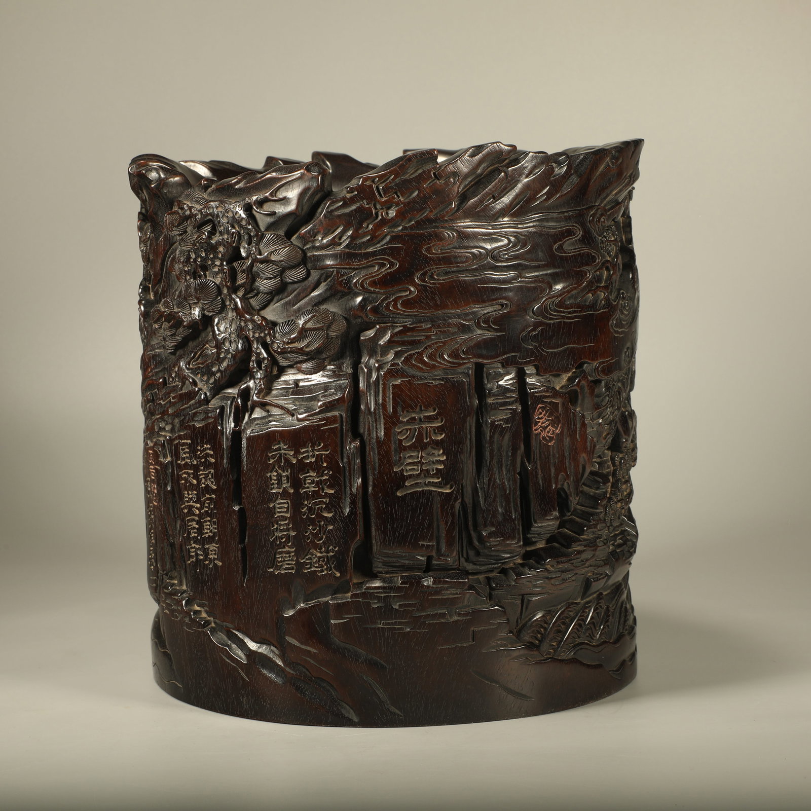 A RED SANDALWOOD BRUSH POT CARVED WITH RED CLIFF SCENE (1 of 8)