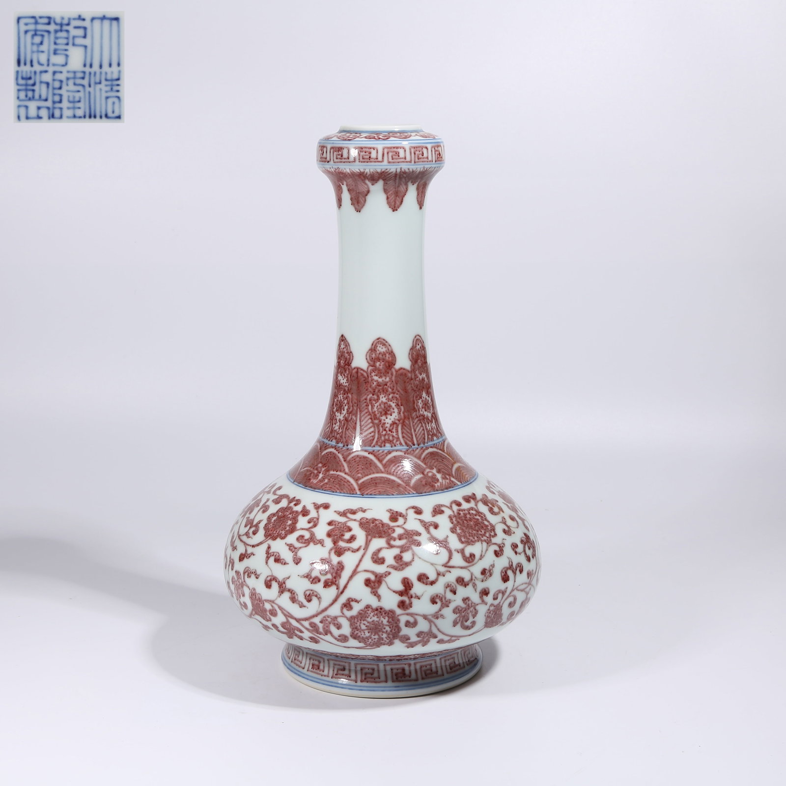 A BLUE-AND-WHITE WITH UNDERGLAZE RED INTERTWINED FLORAL VASE (1 of 9)