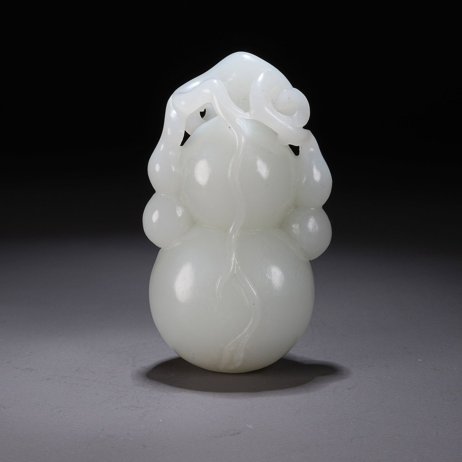 A HETIAN WHITE JADE "ENDLESS FORTUNE AND PROSPERITY" PENDANT (1 of 9)