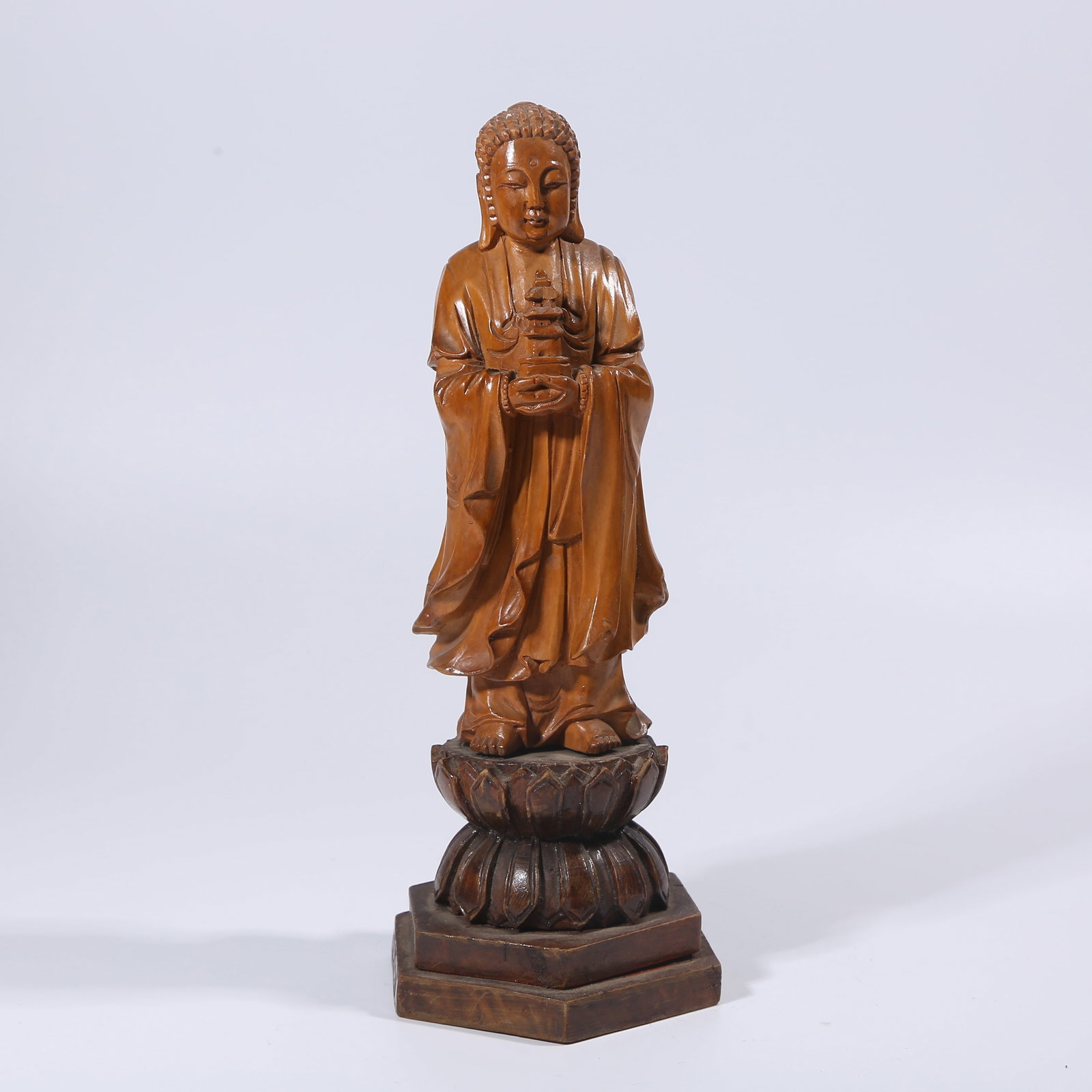 A HUANGHUALI WOOD SHAKYAMUNI STATUE: Huanghuali Wood Shakyamuni Statue