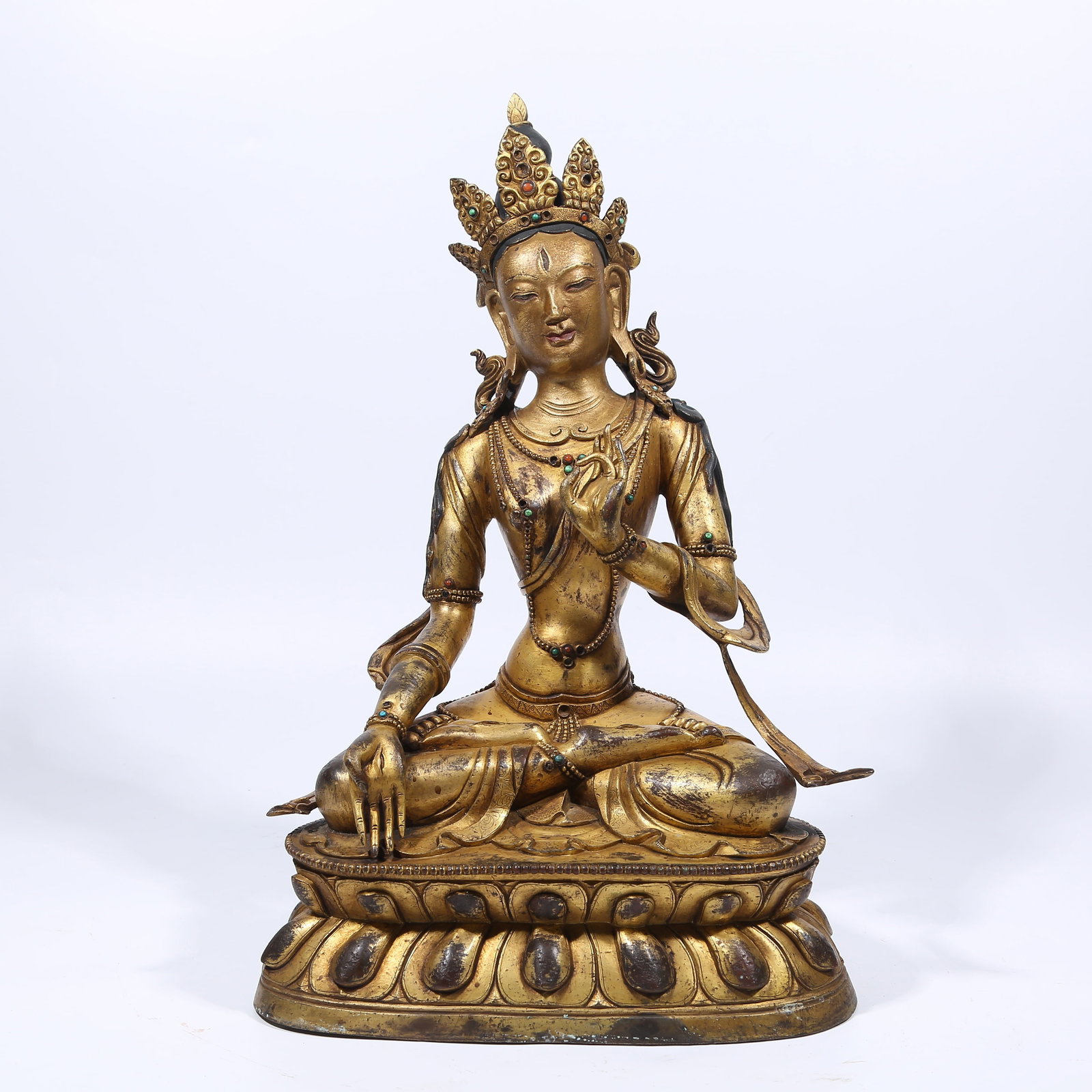 A GILT BRONZE WHITE TARA STATUE (1 of 8)