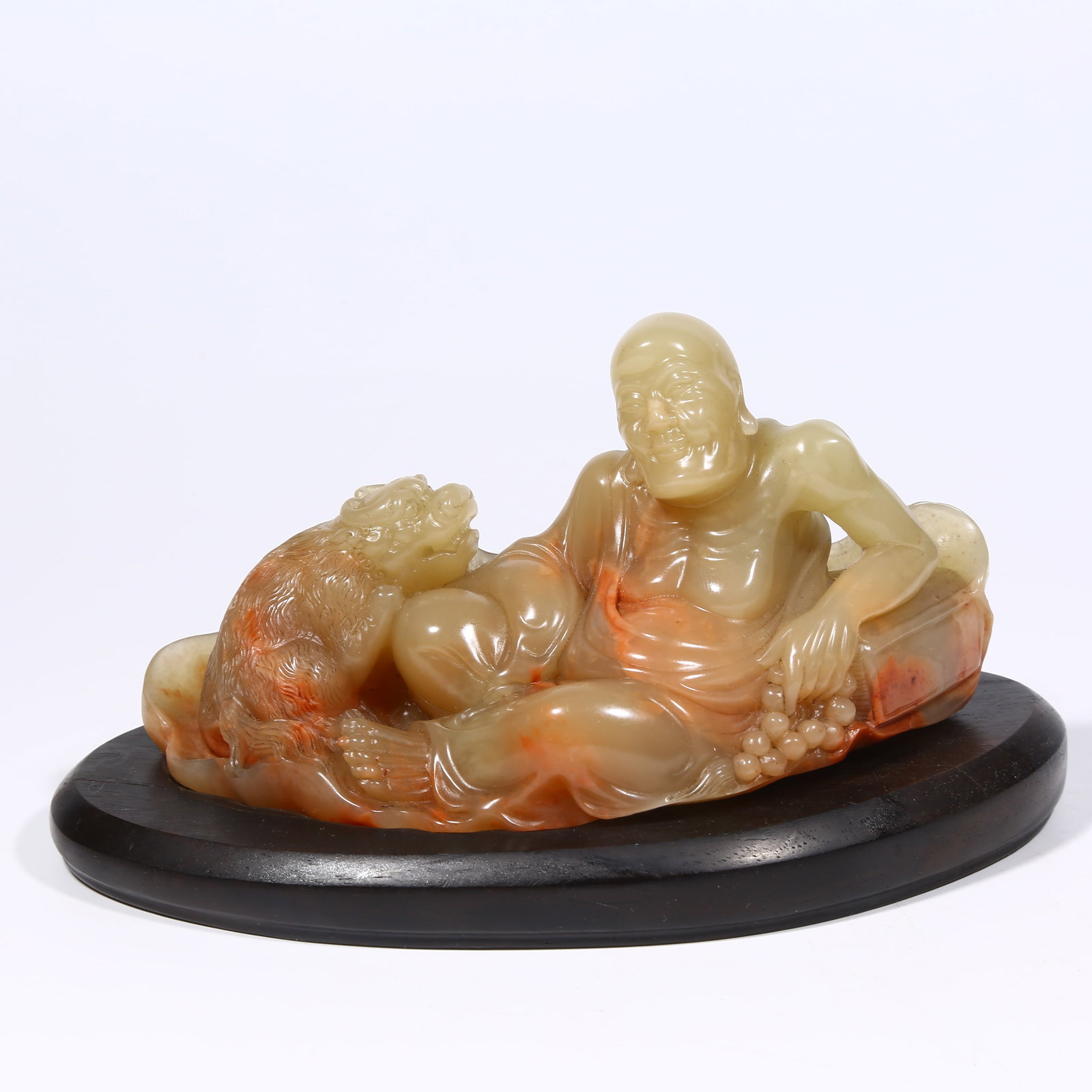 A SHOUSHAN STONE ARHAT FIGURINE: Shoushan stone Arhat figurine