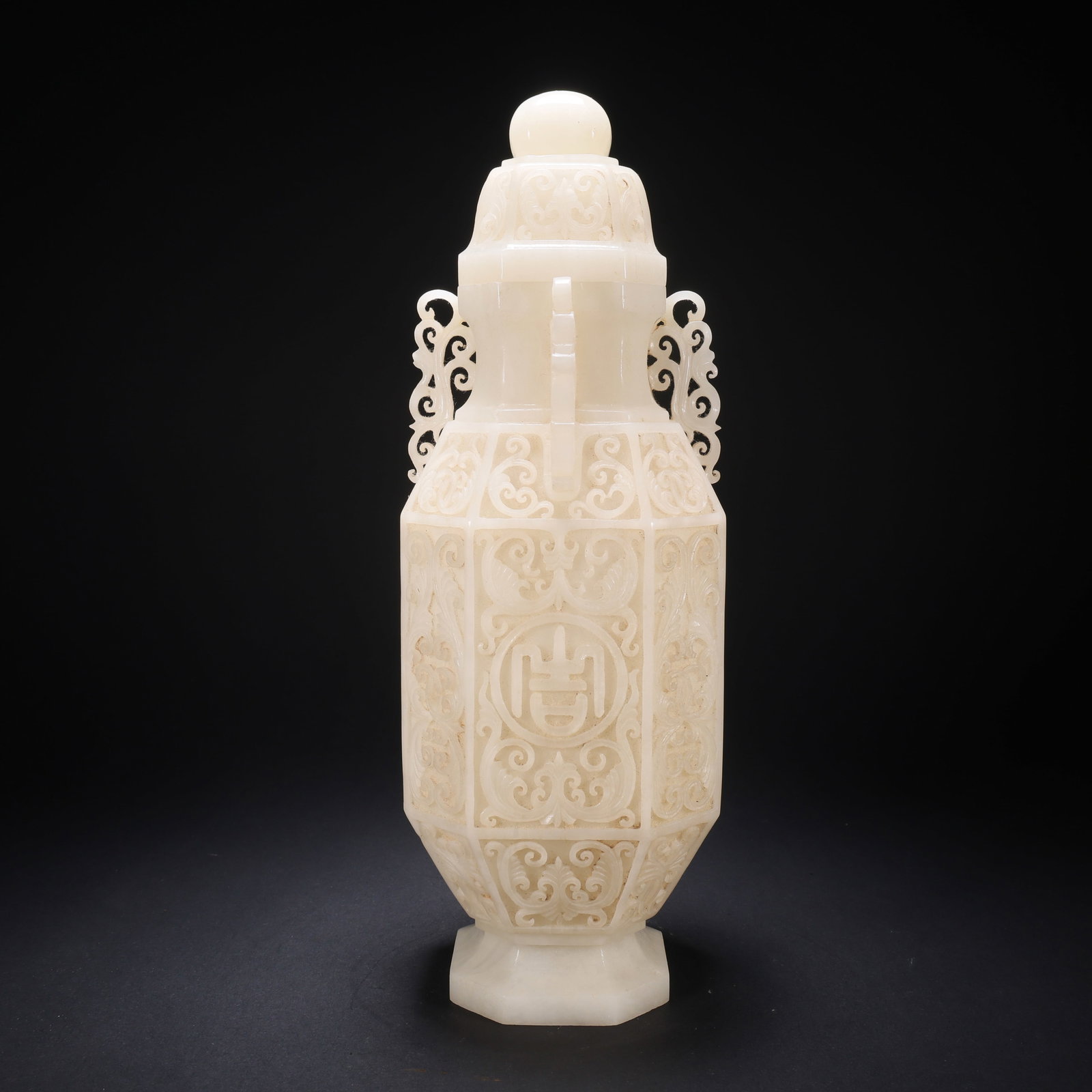 A HETIAN JADE AUSPICIOUS RUYI EIGHT-DIRECTIONS BOTTLE (1 of 9)