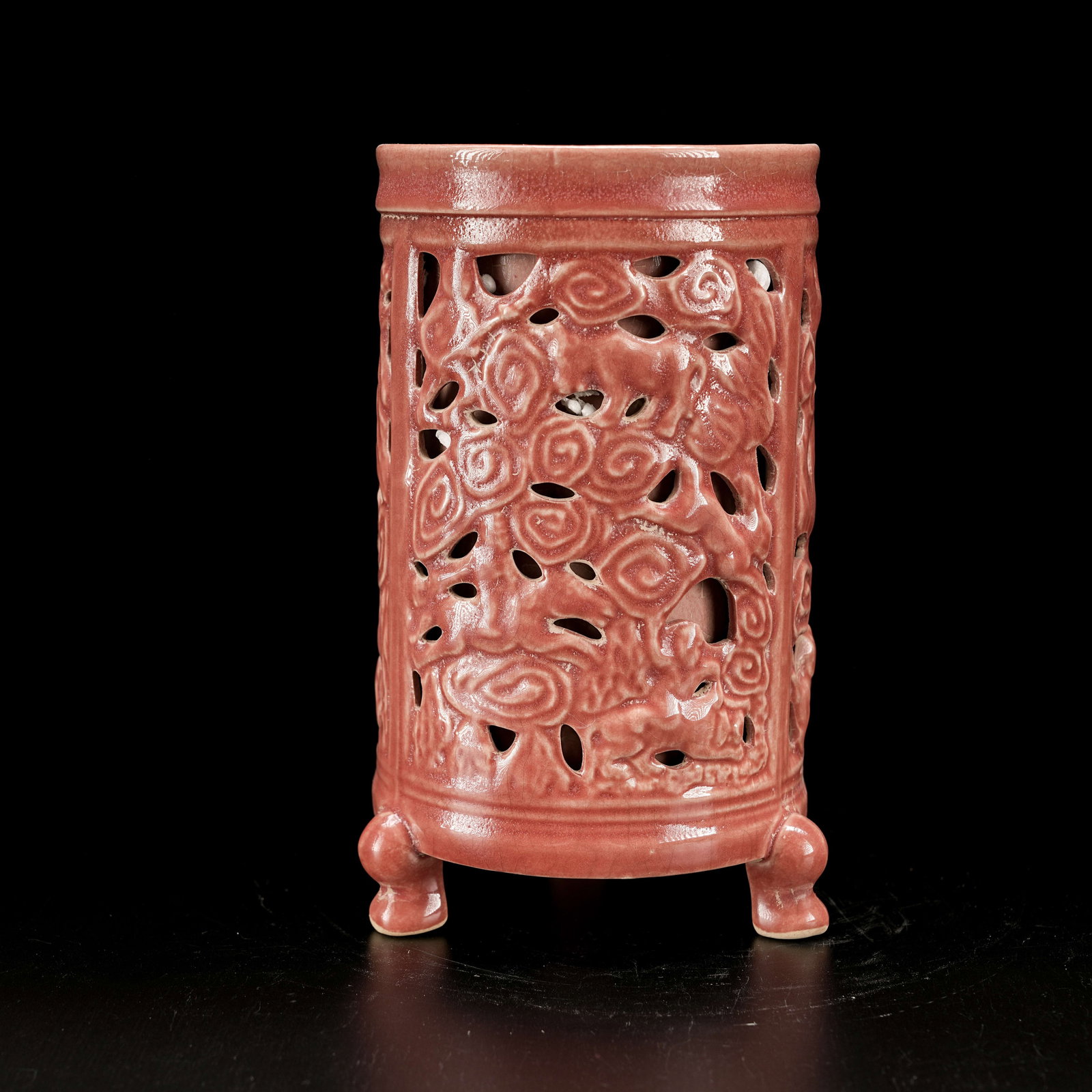 A LANG KILN RED GLAZED BRUSH POT WITH LINGZHI MOTIF: Lang Kiln Red Glazed Brush Pot with Lingzhi Motif