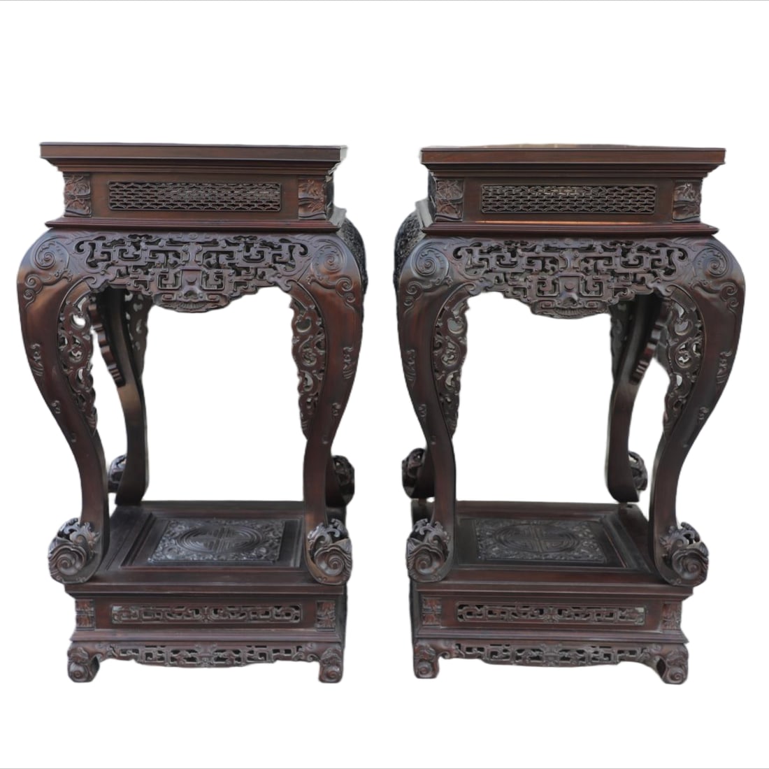 A PAIR OF MAHOGANY INCENSE STANDS CARVED WITH INTERLOCKING DRAGON PATTERN (1 of 7)
