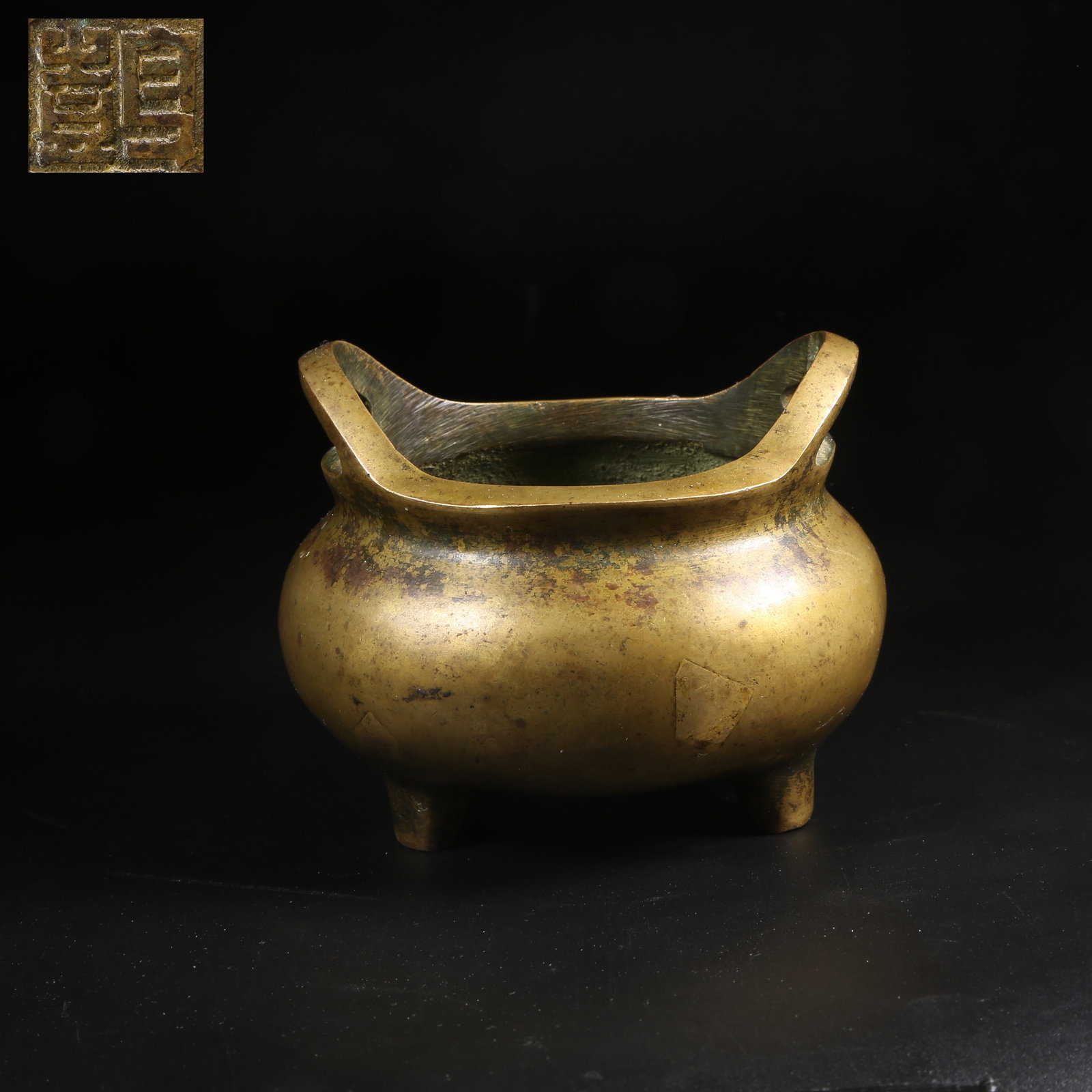 A BRONZE TRIPOD BRIDGE-HANDLE CENSER: Bronze Tripod Bridge-Handle Censer