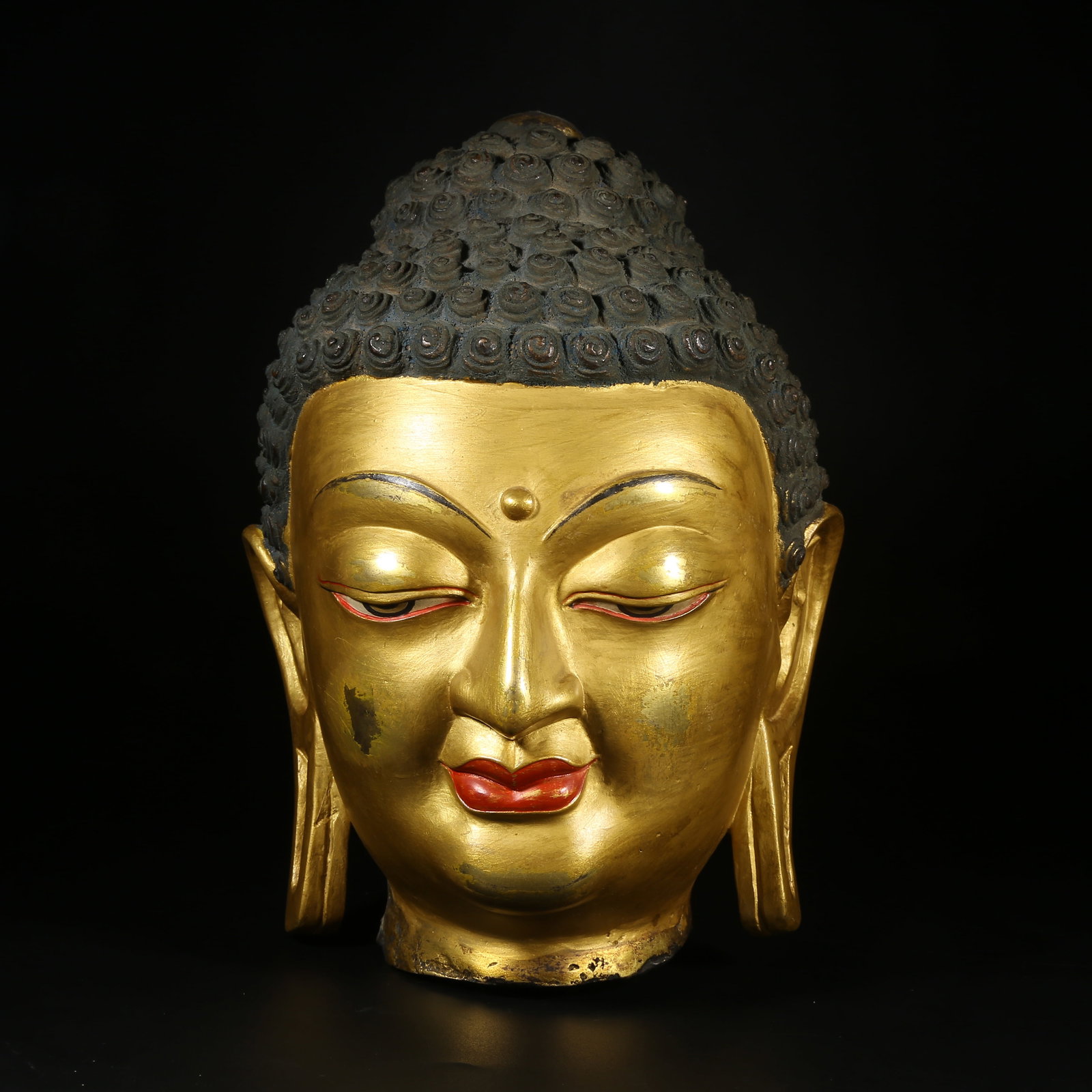 A GILT-BRONZE BUDDHA HEAD (1 of 8)