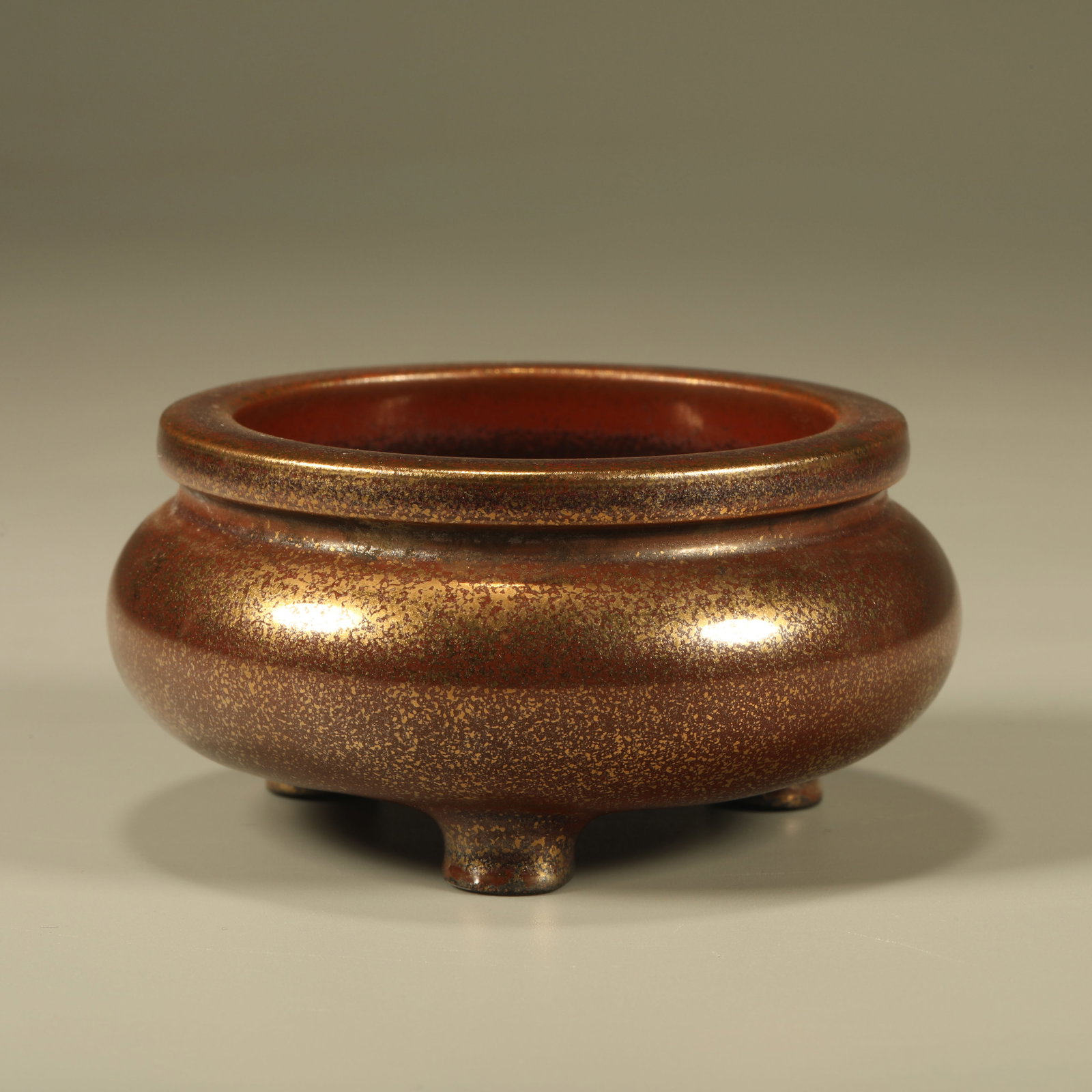A BLACK GOLD GLAZED THREE-LEGGED INCENSE BURNER (1 of 6)