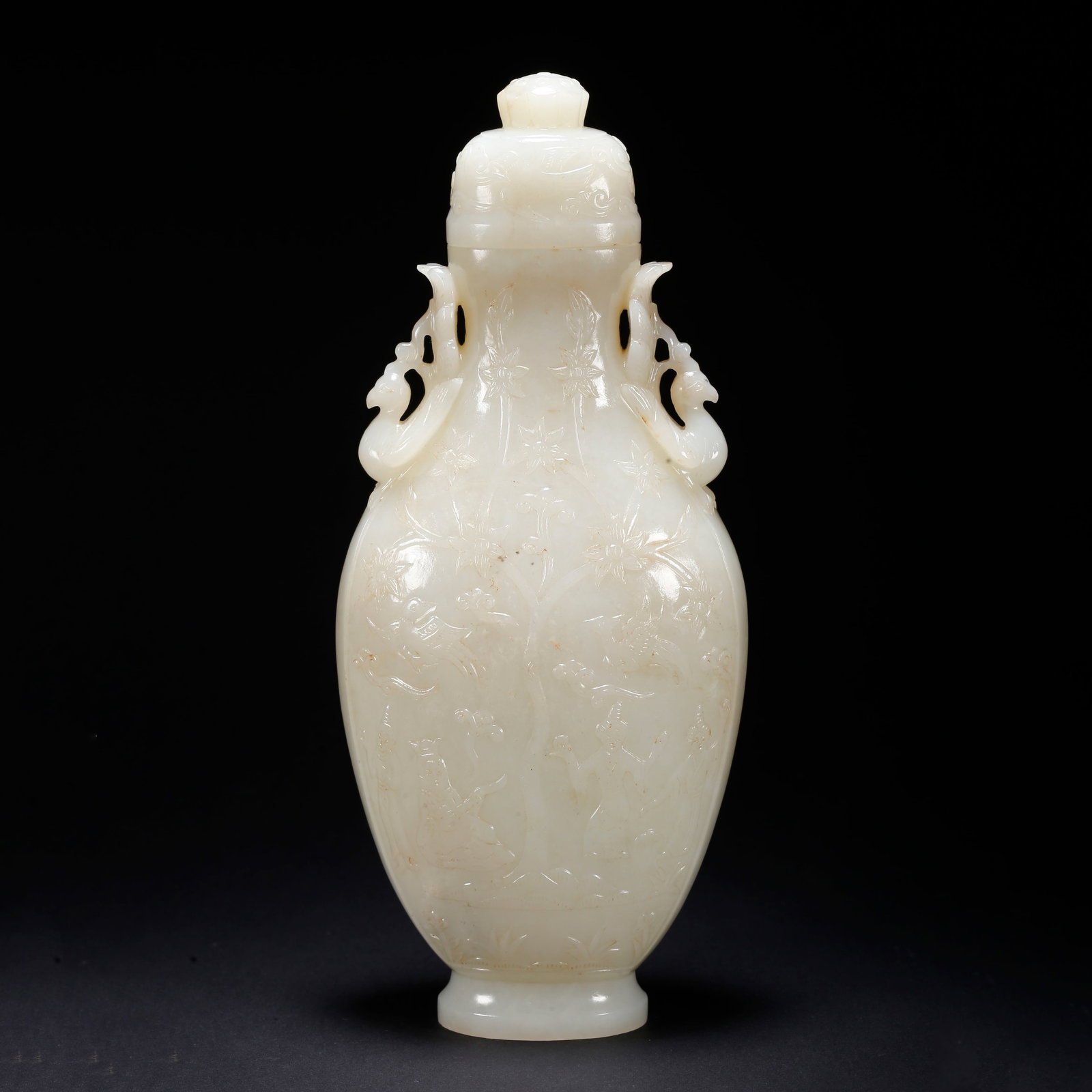 A HETIAN JADE DOUBLE-HANDLED COVERED BOTTLE WITH FIGURE MOTIF (1 of 10)