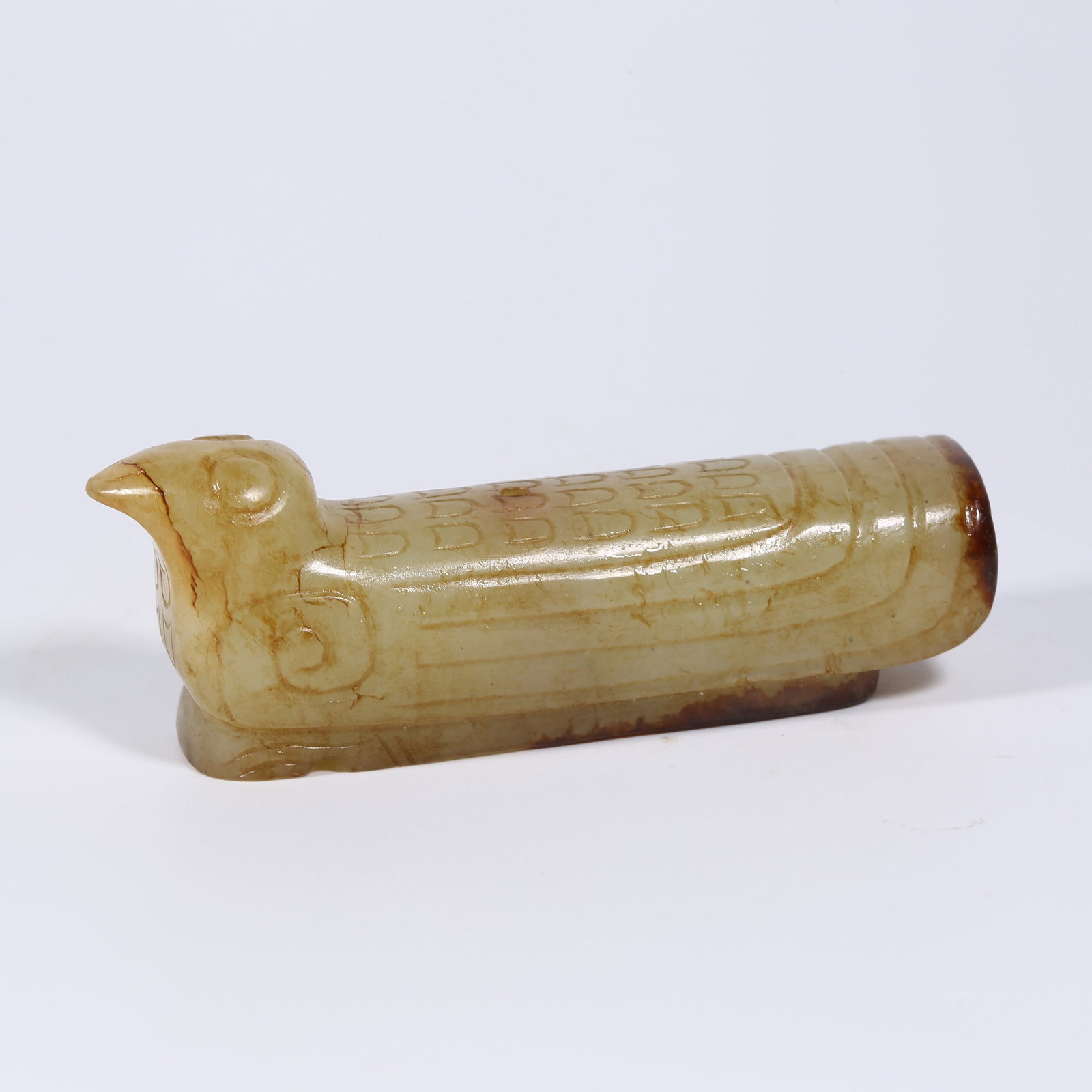 A ANCIENT JADE DOVE-SHAPED PENDANT: Ancient Jade Dove-Shaped Pendant