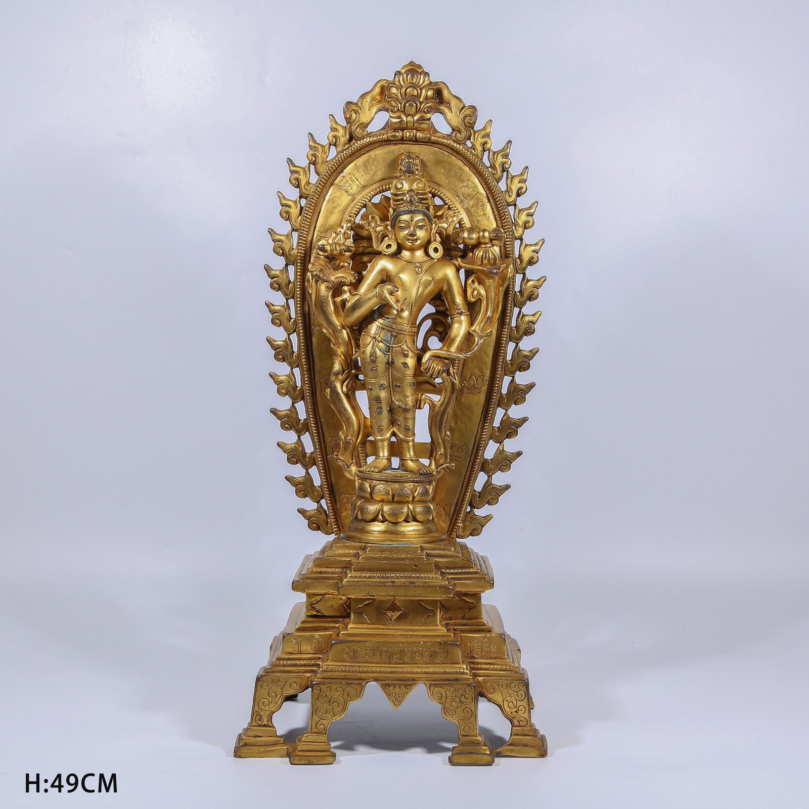 A GILT BRONZE LOTUS-HAND AVALOKITESHVARA STANDING STATUE: Gilt Bronze Lotus-Hand Avalokiteshvara Standing Statue
