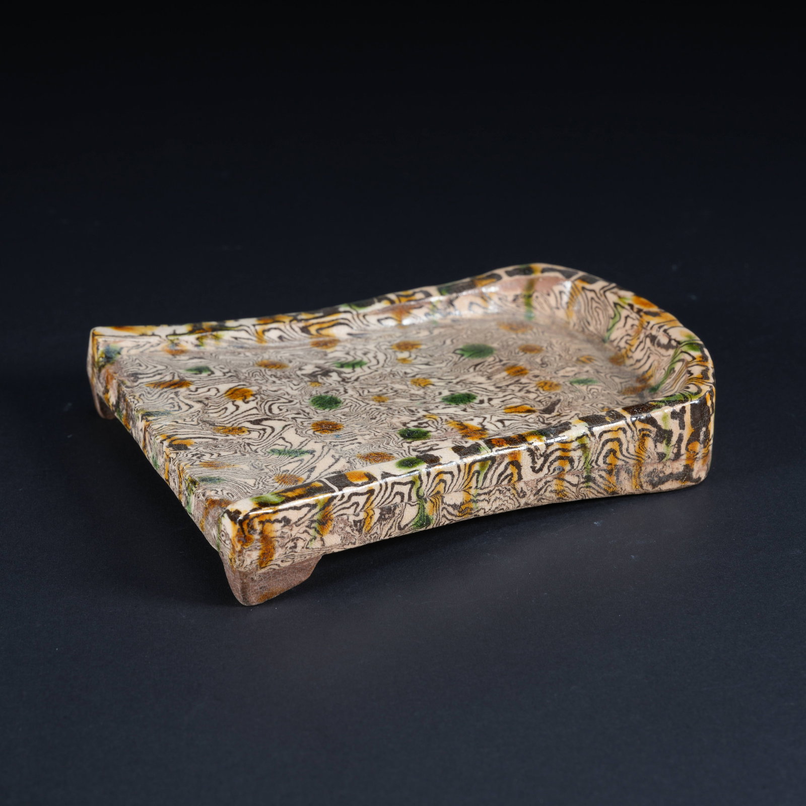 A MARBLED CLAY GLAZED INKSTONE (1 of 8)